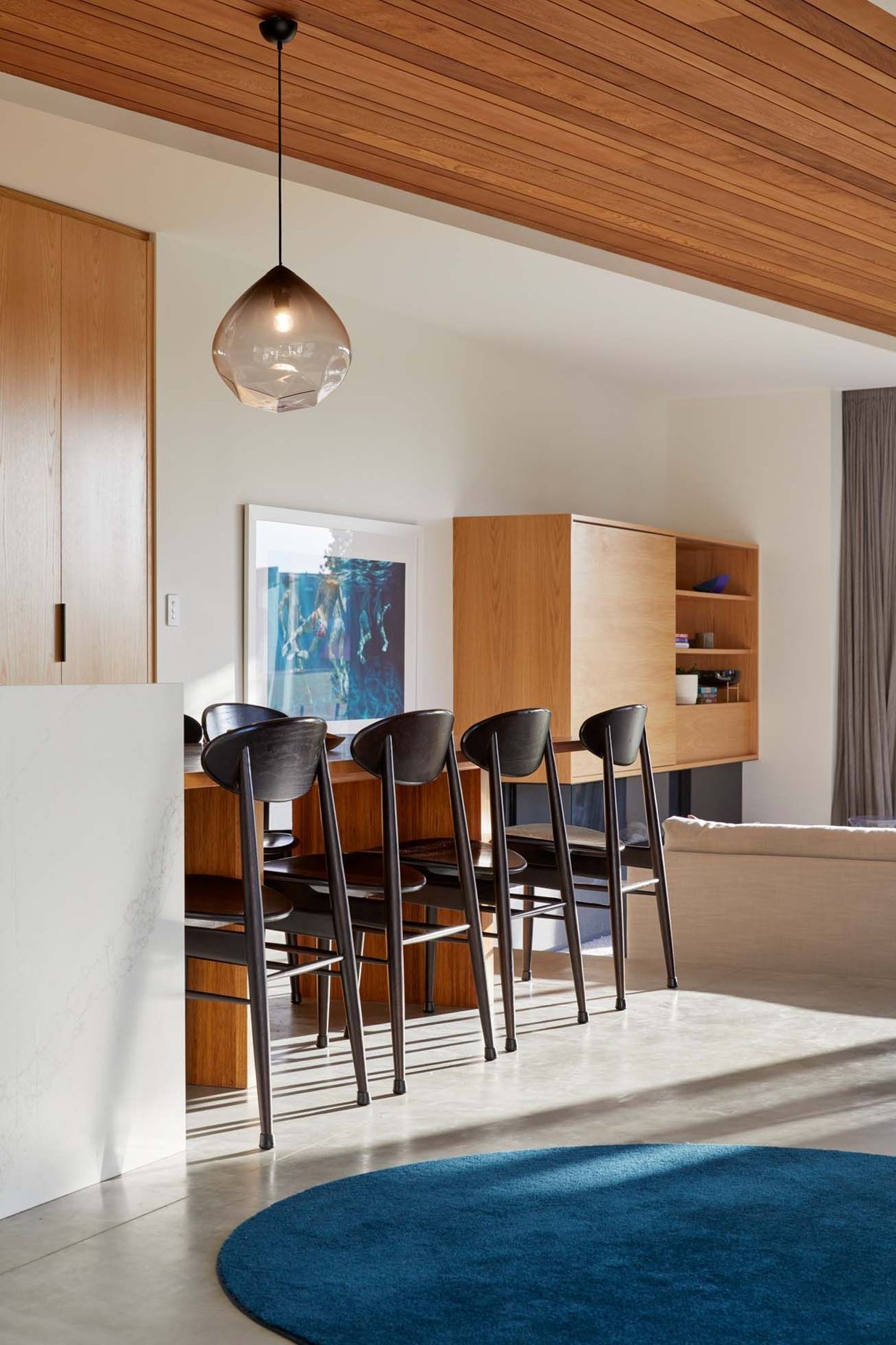A desk in the kitchen window is perfect for the owners' three children to study (right).