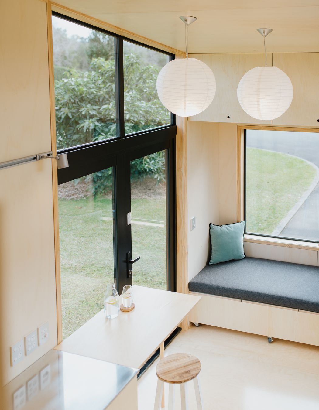 The view from the mezzanine to the French doors and seating.