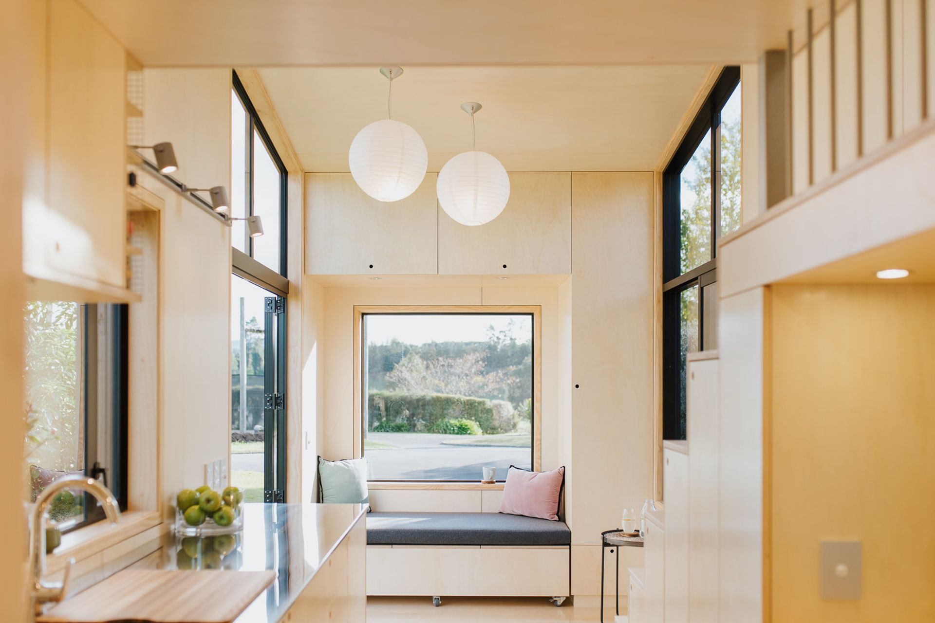 The ceiling is 4.2m high drawing in plenty of sunlight to create a more spacious feel. Photography supplied by Build Tiny.