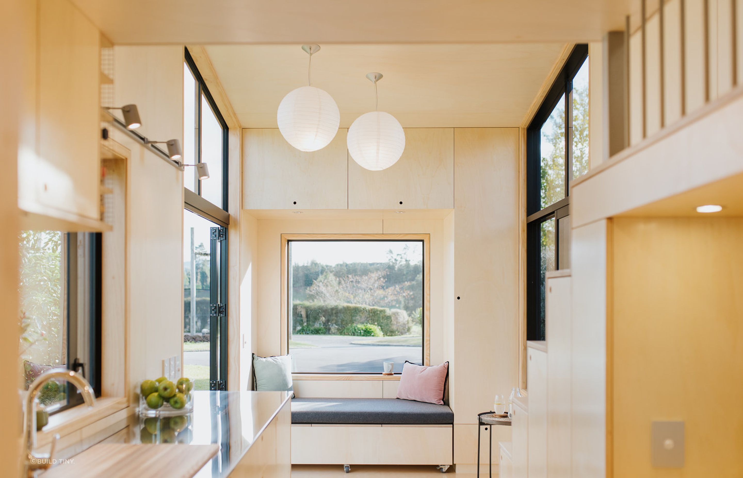 The ceiling is 4.2m high drawing in plenty of sunlight to create a more spacious feel. Photography supplied by Build Tiny.