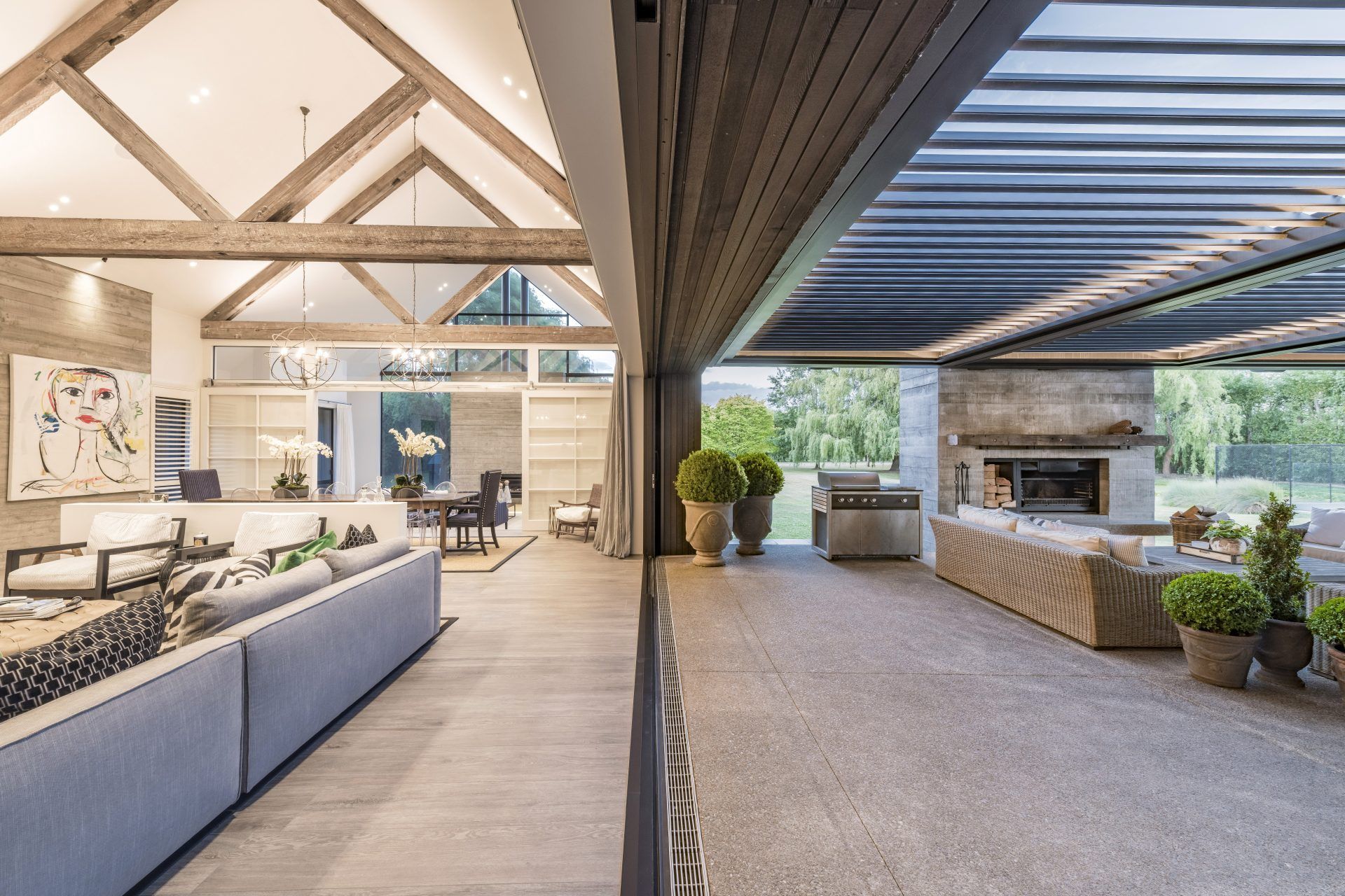 An extra-wide opening joins the inside to the outside of the house.