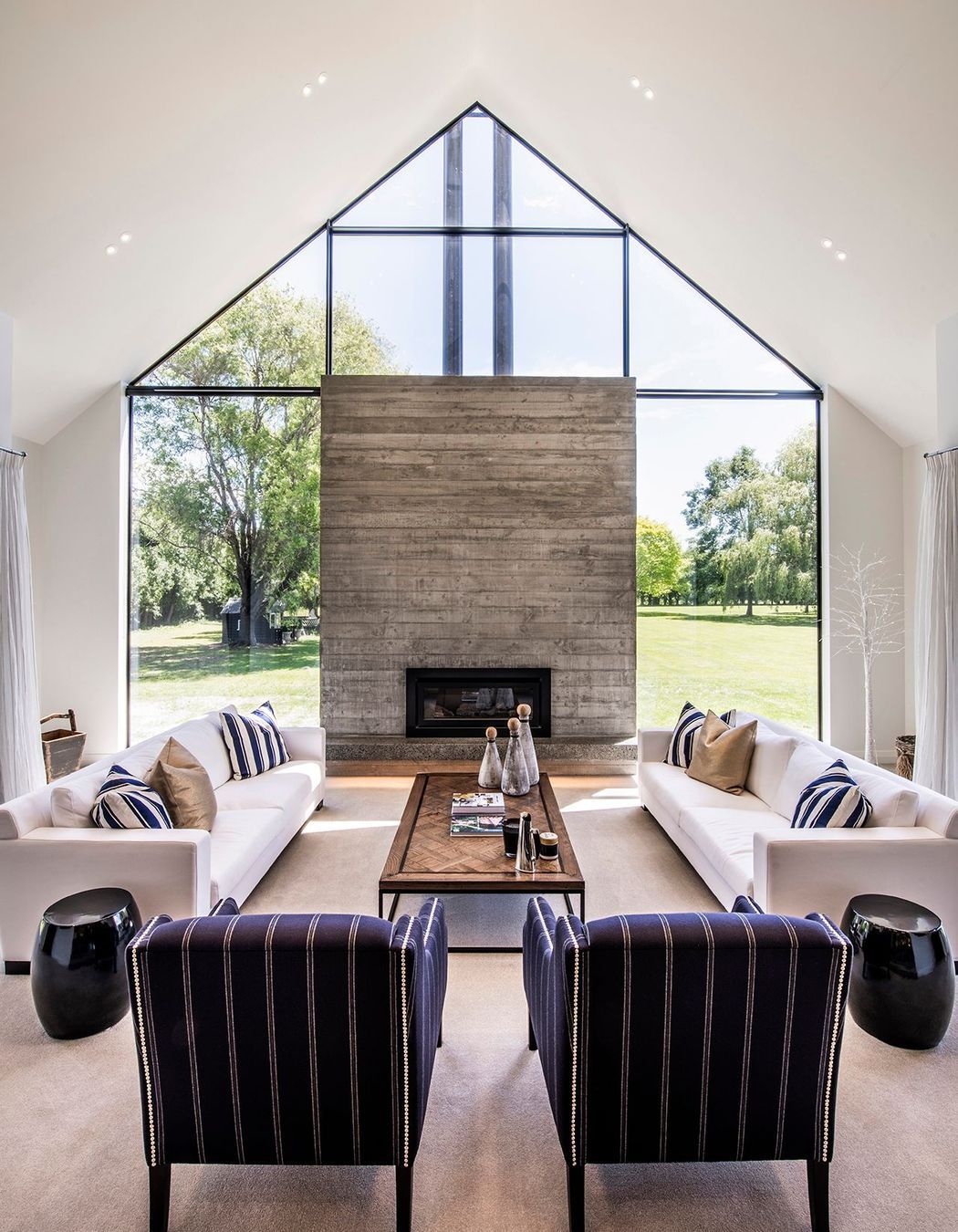 The glazed gable end opens the house up to the surrounding landscape.