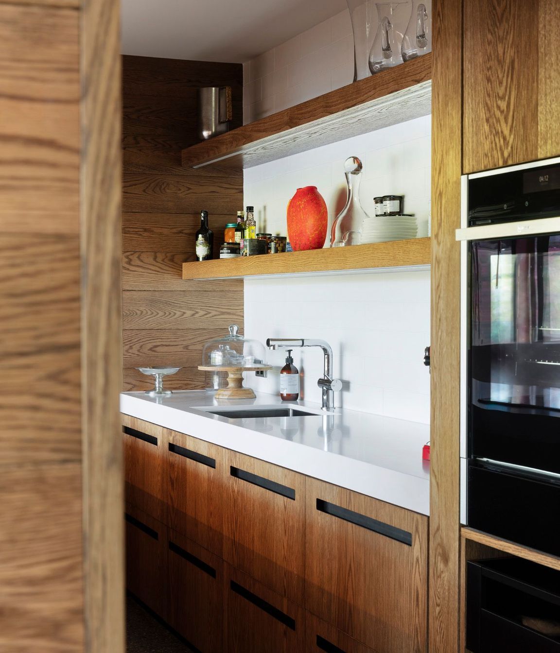 The scullery incorporates high-quality appliances, such as these Neff ovens..