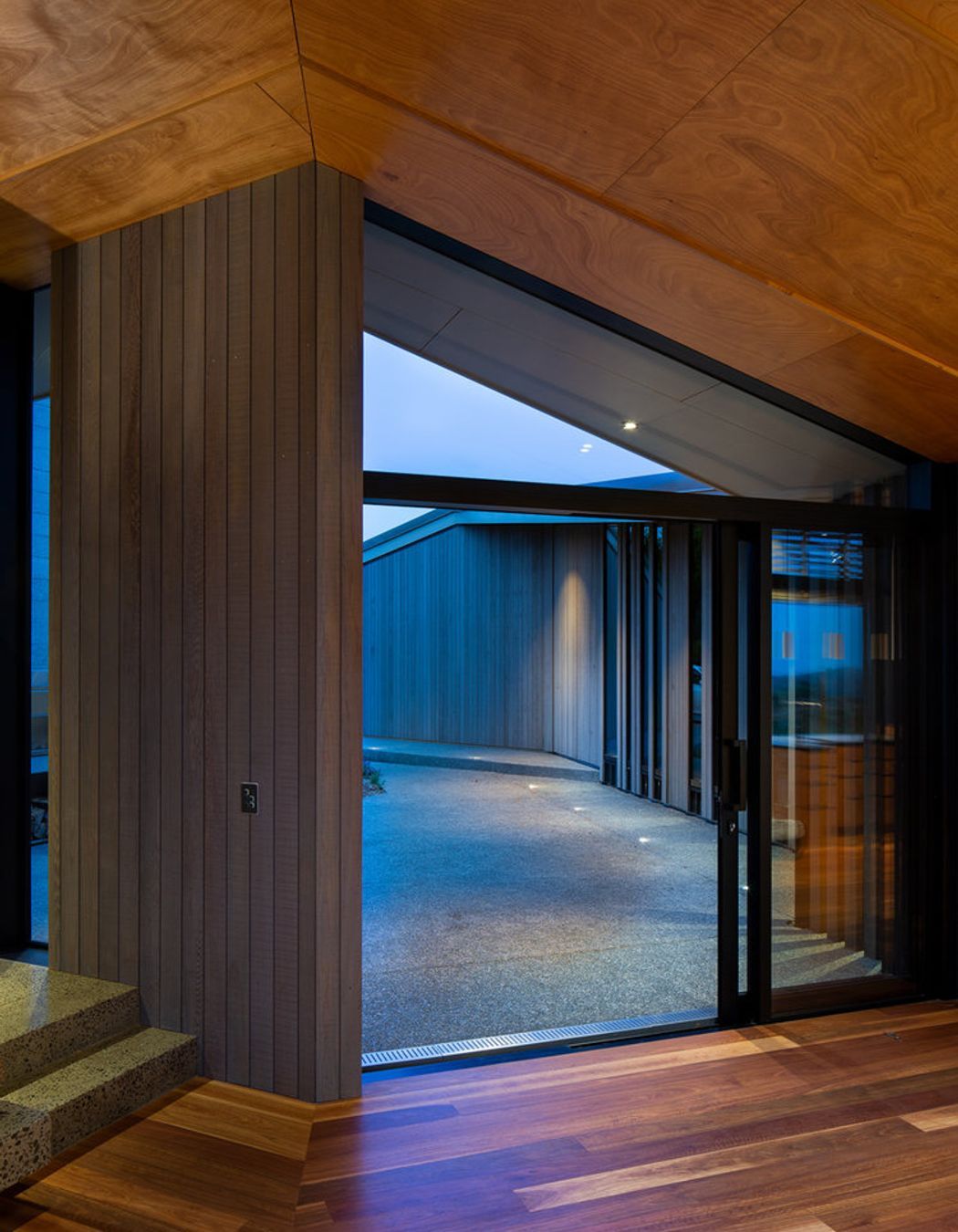 Okoume plywood ceiling and spotted gum timber flooring add warmth to the interior.