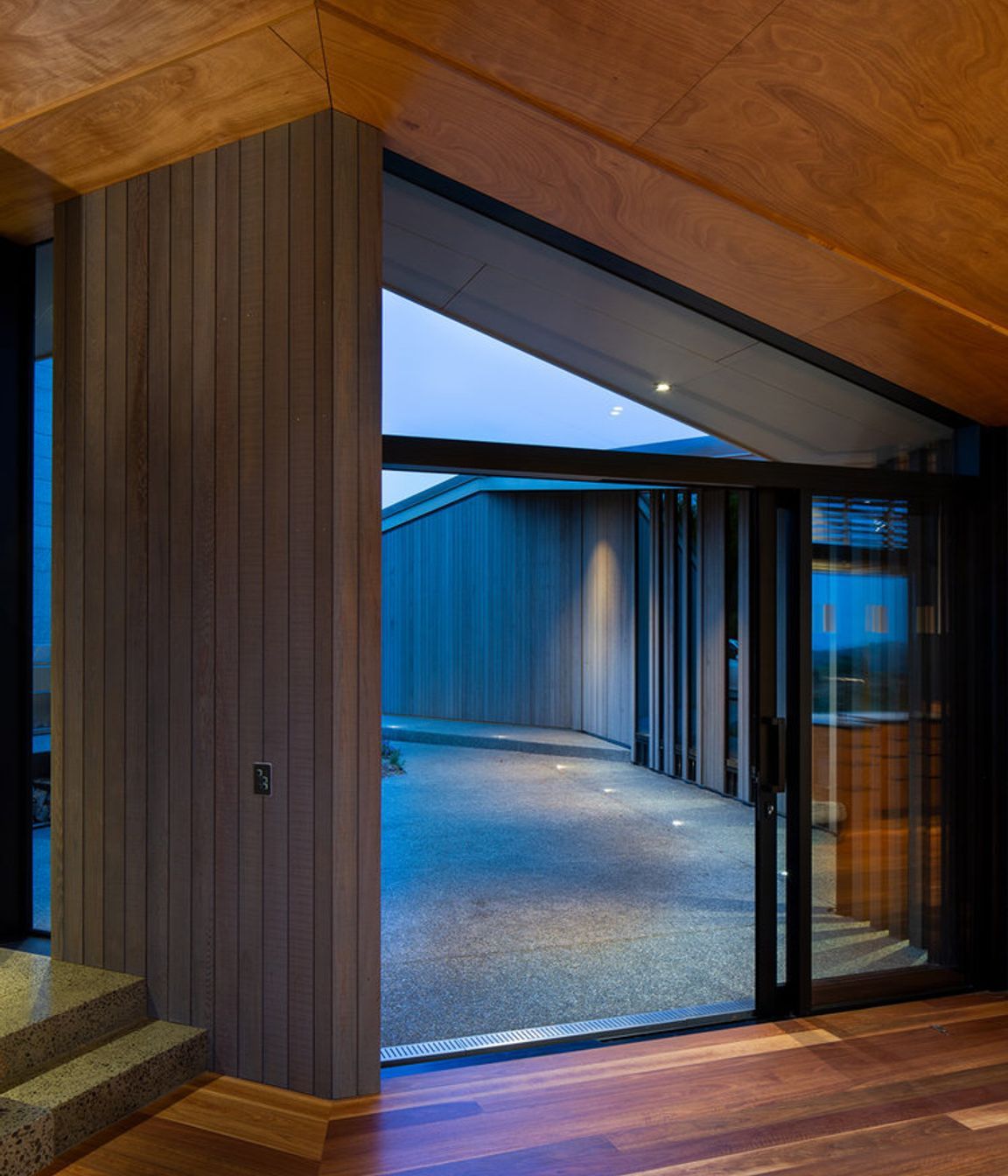 Okoume plywood ceiling and spotted gum timber flooring add warmth to the interior.