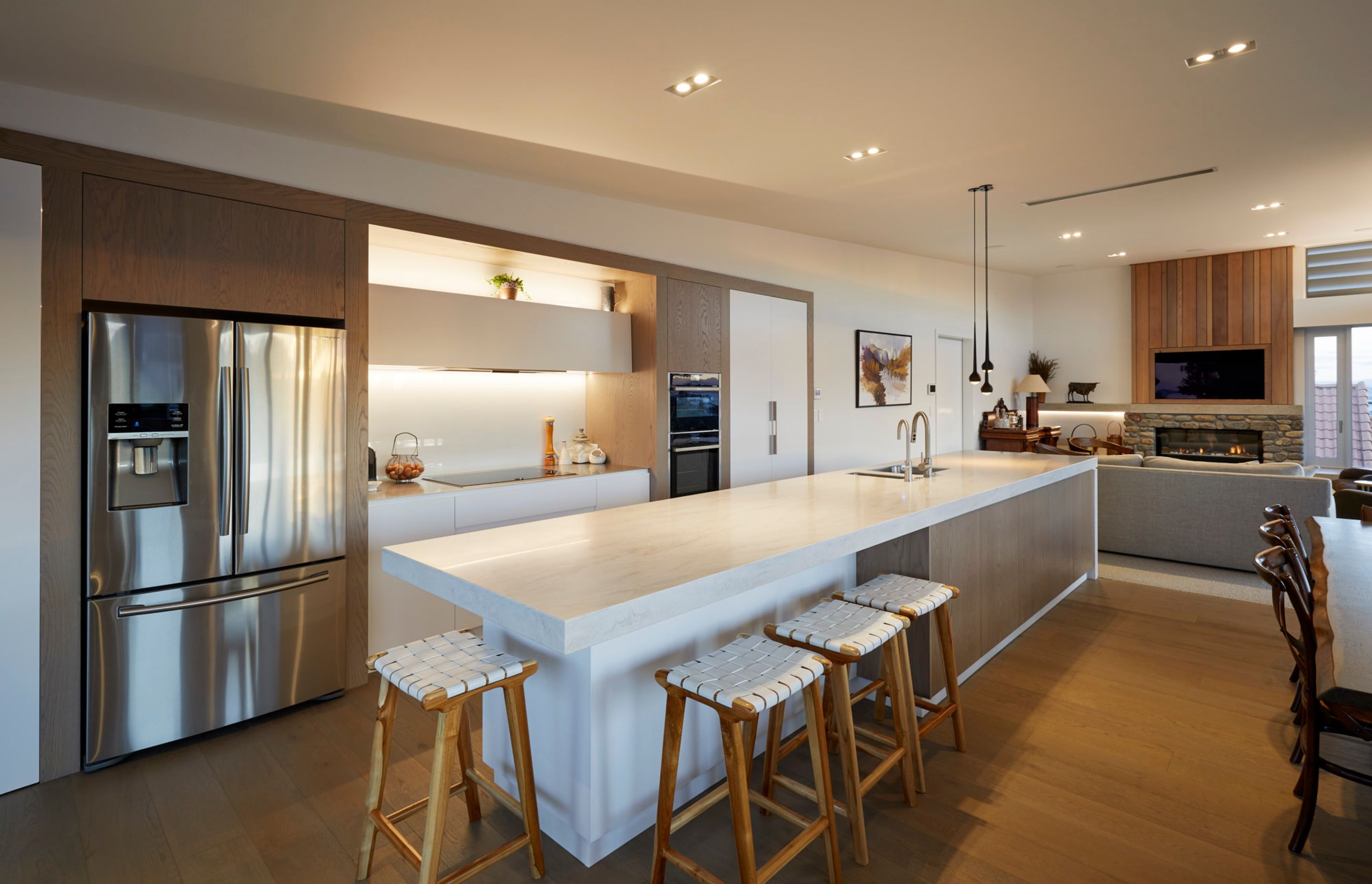 A generously appointed kitchen, featuring expansive island, is the centrepiece of the living area and makes catering for large groups a cinch.
