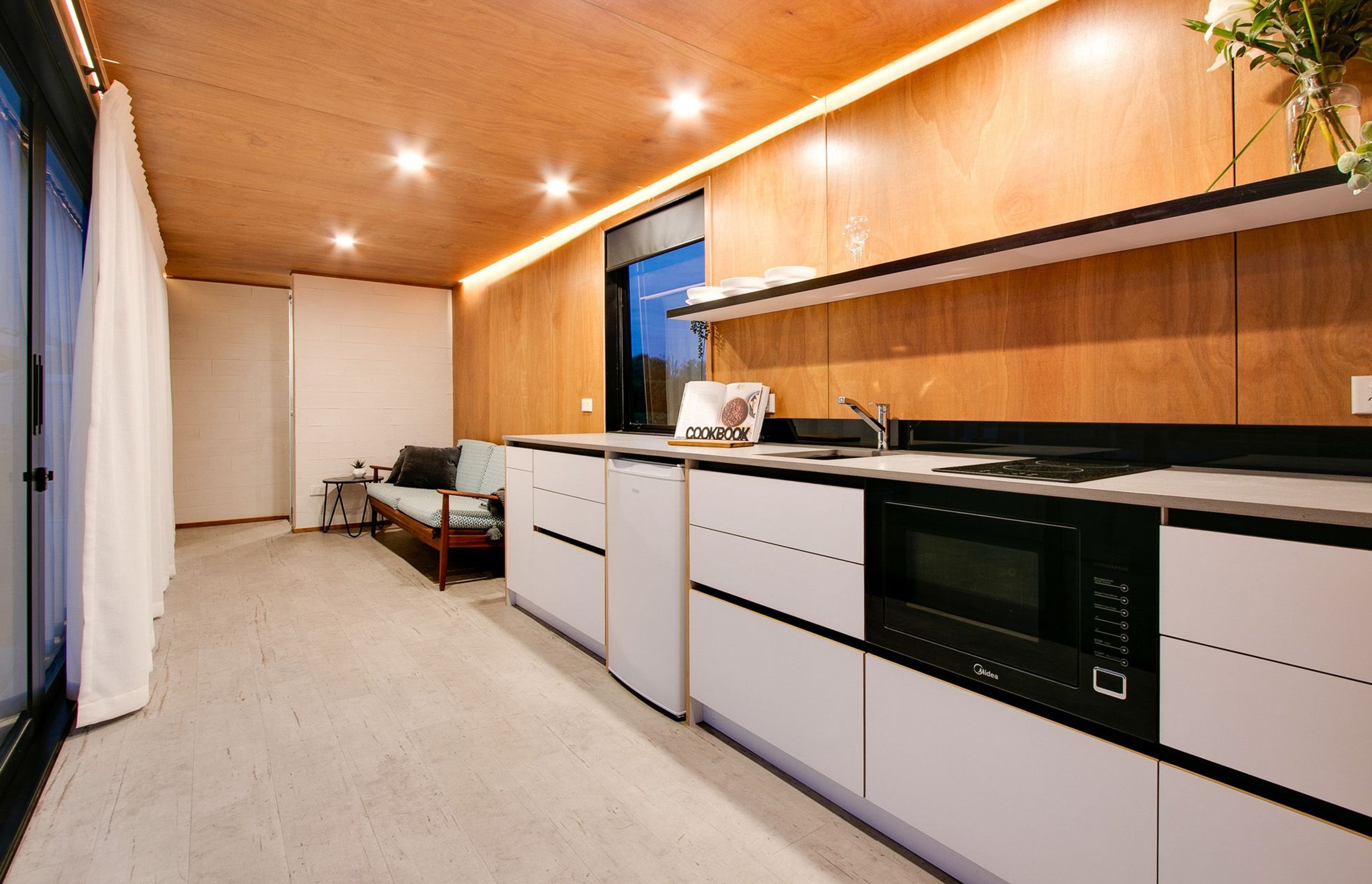 The simple kitchen and lounge area.