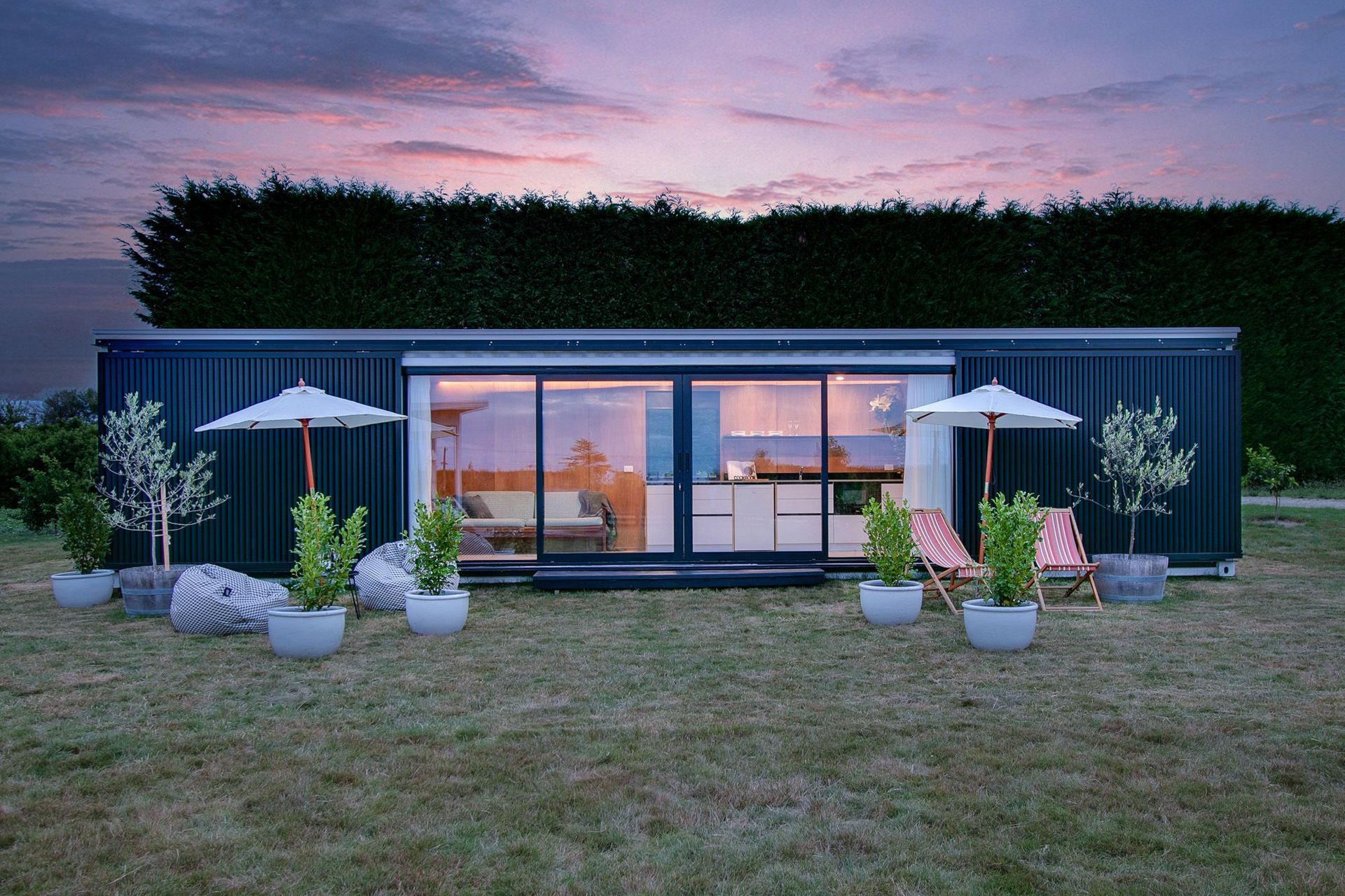 The home includes kitchen and living spaces, plus one bedroom, a bathroom and a laundry area