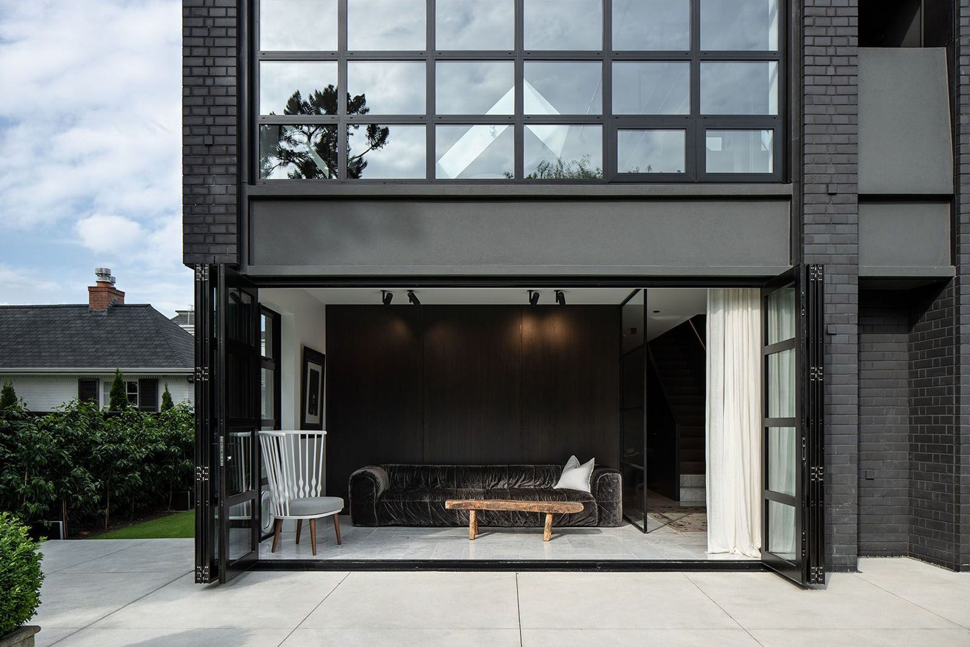 The lower courtyard opens out from a second living area, while next to it an unexpected alcove adds a sense of what could have been.