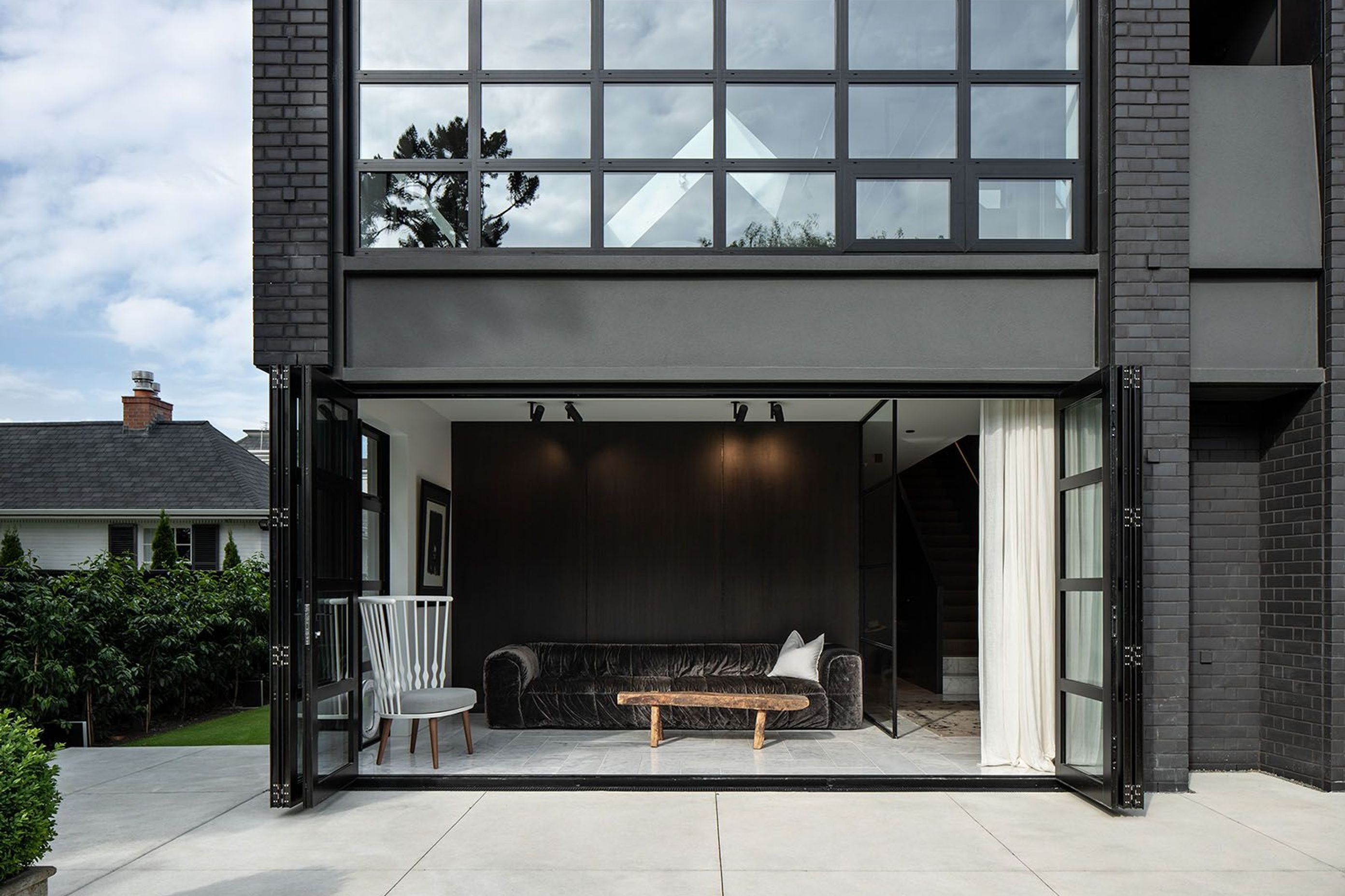 The lower courtyard opens out from a second living area, while next to it an unexpected alcove adds a sense of what could have been.