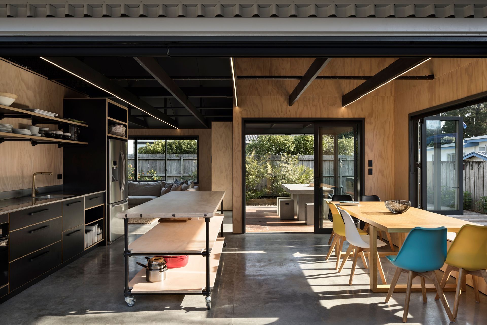 The living spaces blend seamlessly into each other for communal living.