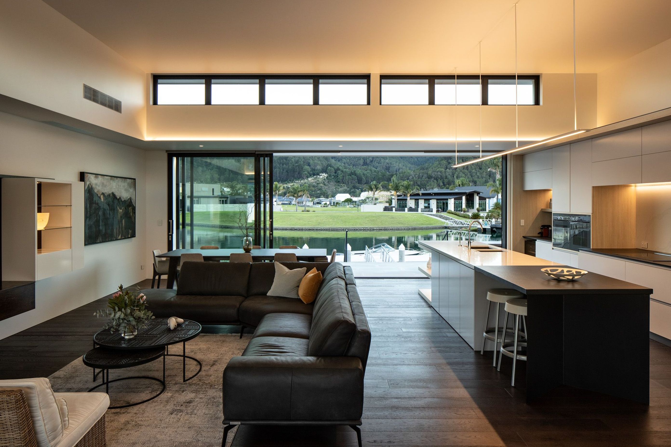 The open-plan kitchen, dining and living area is a flexible space that flows straight out to the canal.