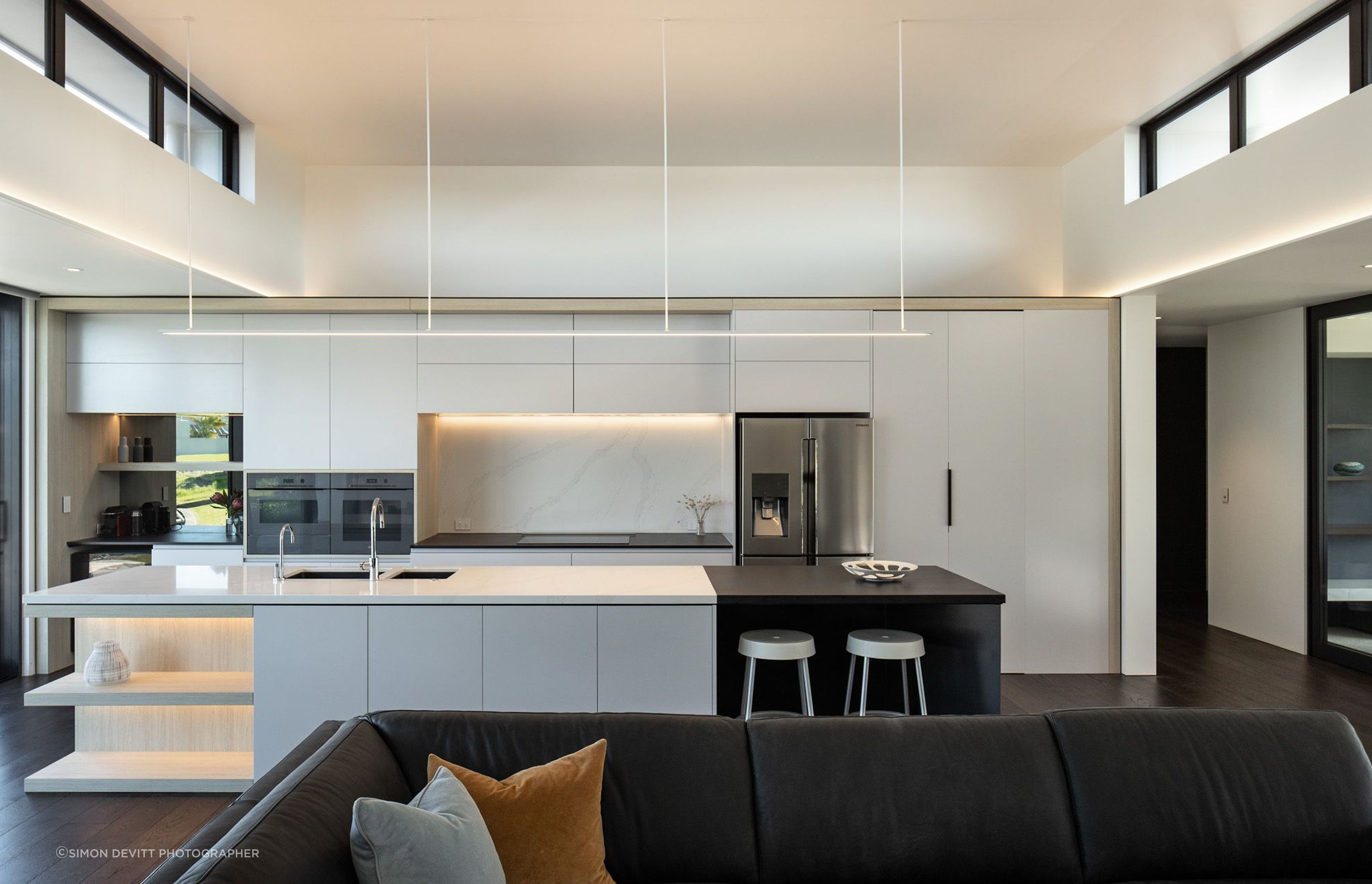 A neutral palette of materials throughout helps to create an elegant and timeless design, seen here in the kitchen.