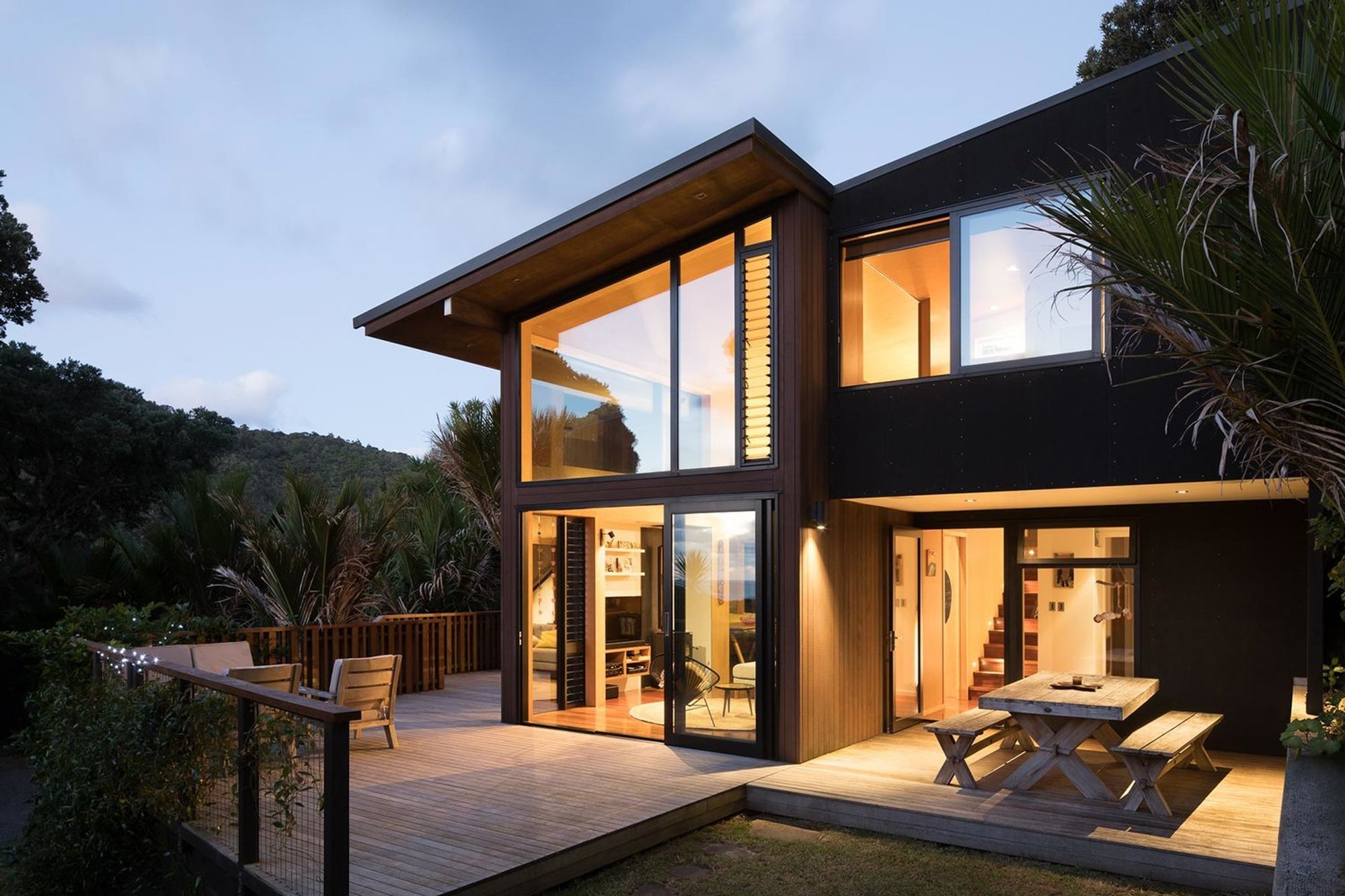 This modest home at the iconic Piha Beach is designed to capture views of bush and sky.