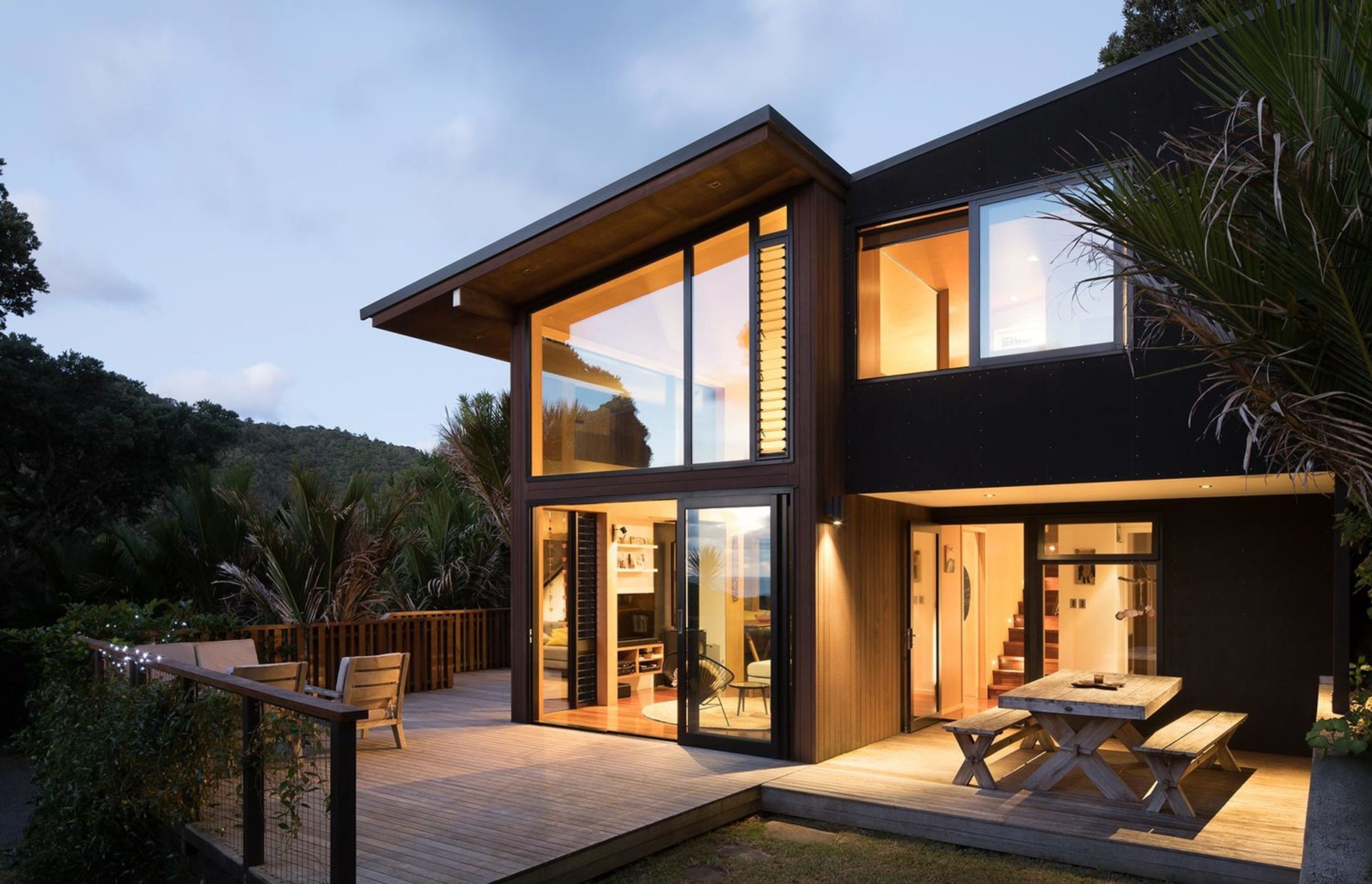 This modest home at the iconic Piha Beach is designed to capture views of bush and sky.