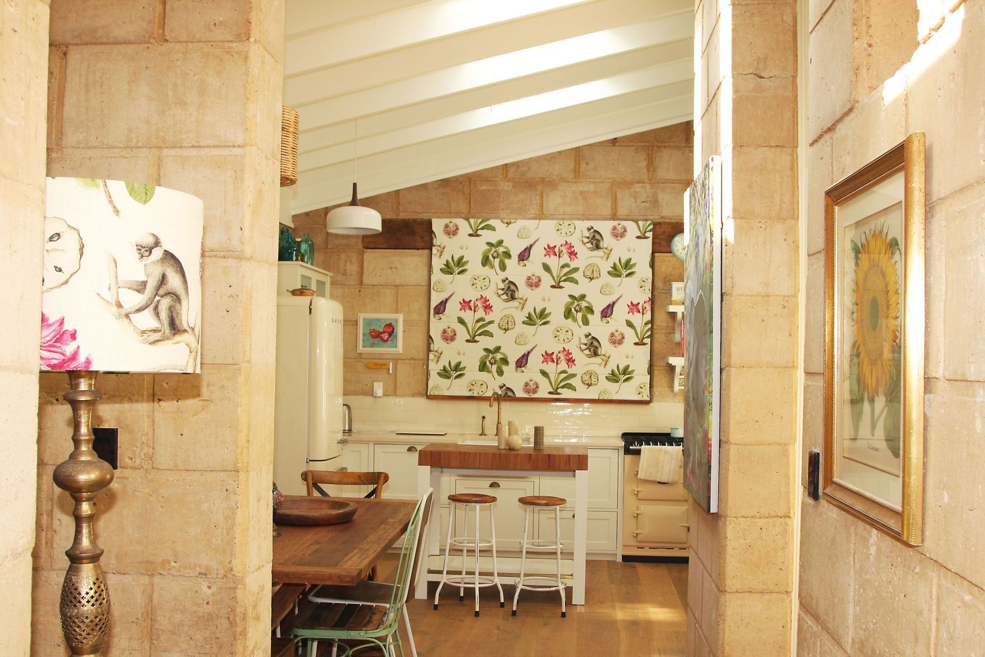 The owner gave me the challenge of arranging his ecclectic collection of furniture and accessories .  We worked happily together until the interior design was to our complete satisfaction