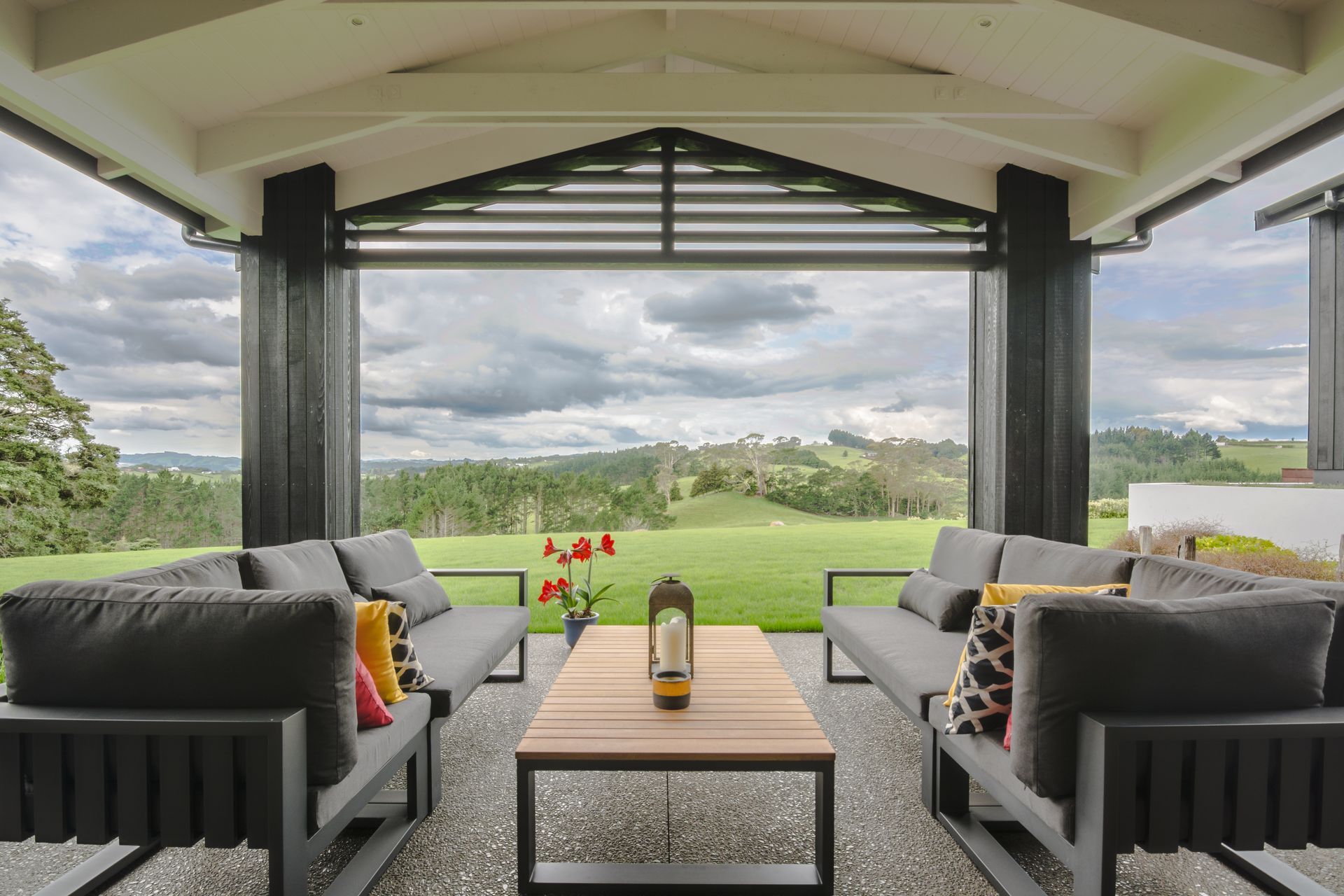 Covered outdoor area off the kitchen and dining area catches the morning sun, and providing a shady spot for afternoons.