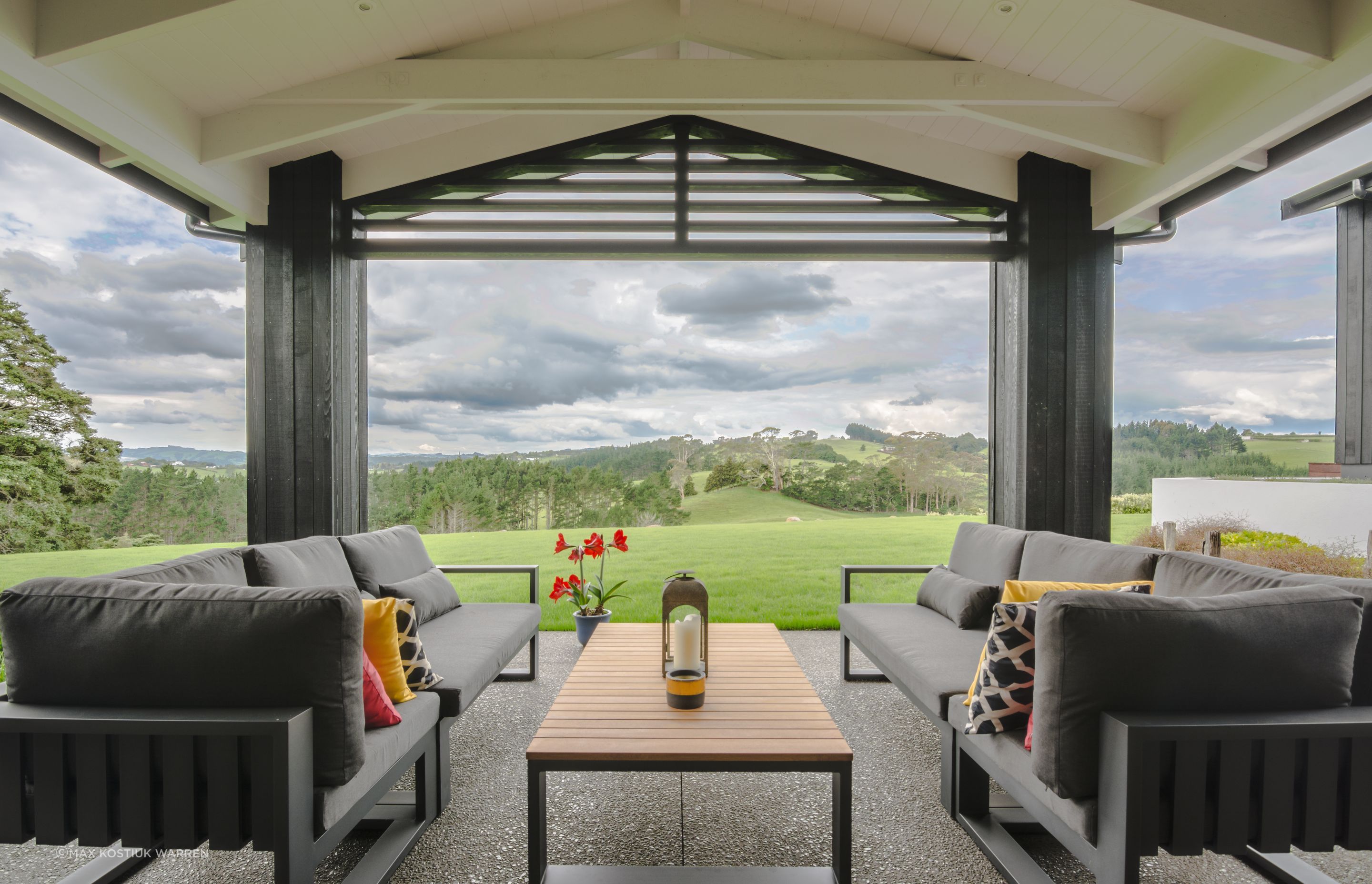 Covered outdoor area off the kitchen and dining area catches the morning sun, and providing a shady spot for afternoons.