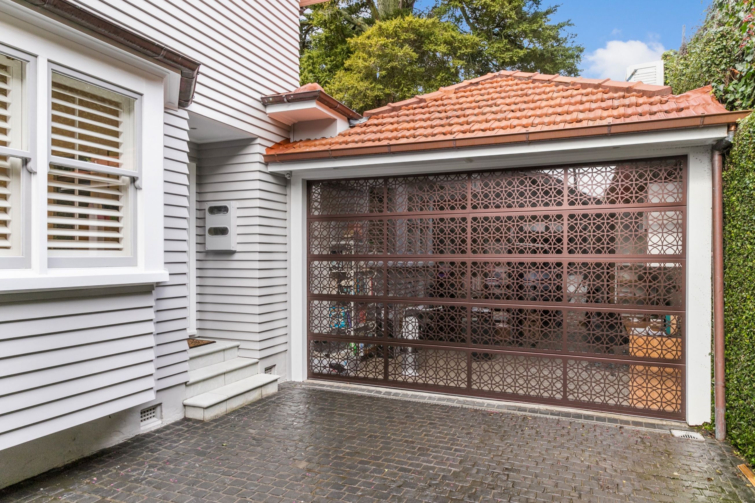 Plexiglass Backed Laser Cut Garage Door