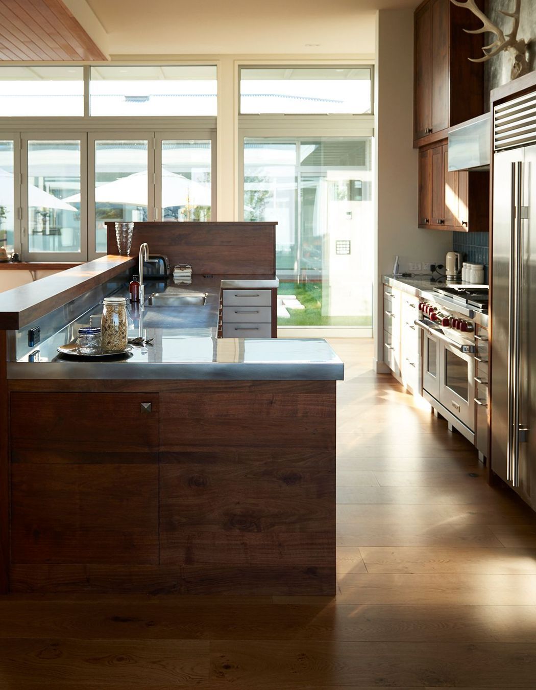 Extra-high benchtops accommodate the owner as he's very tall and loves to cook.