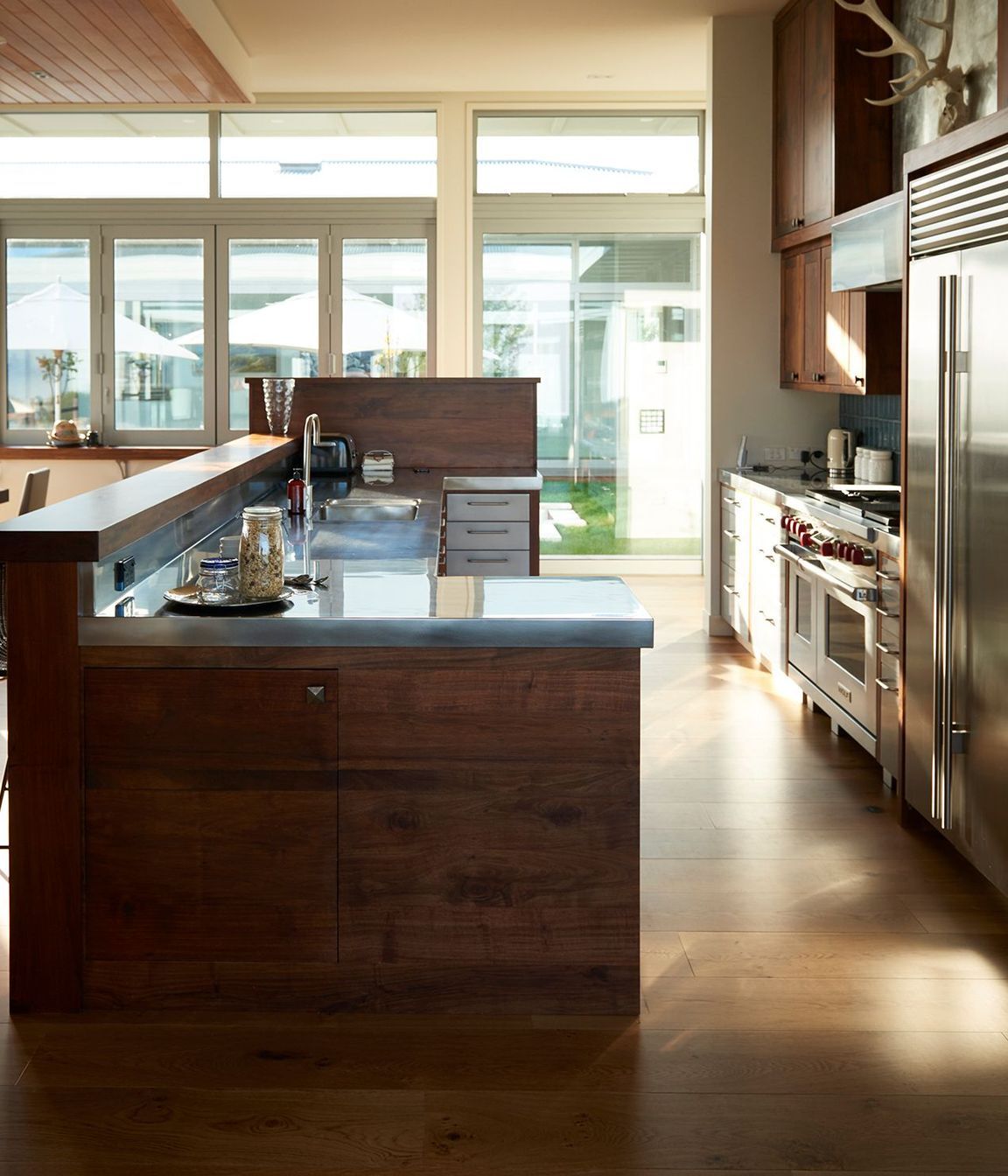 Extra-high benchtops accommodate the owner as he's very tall and loves to cook.