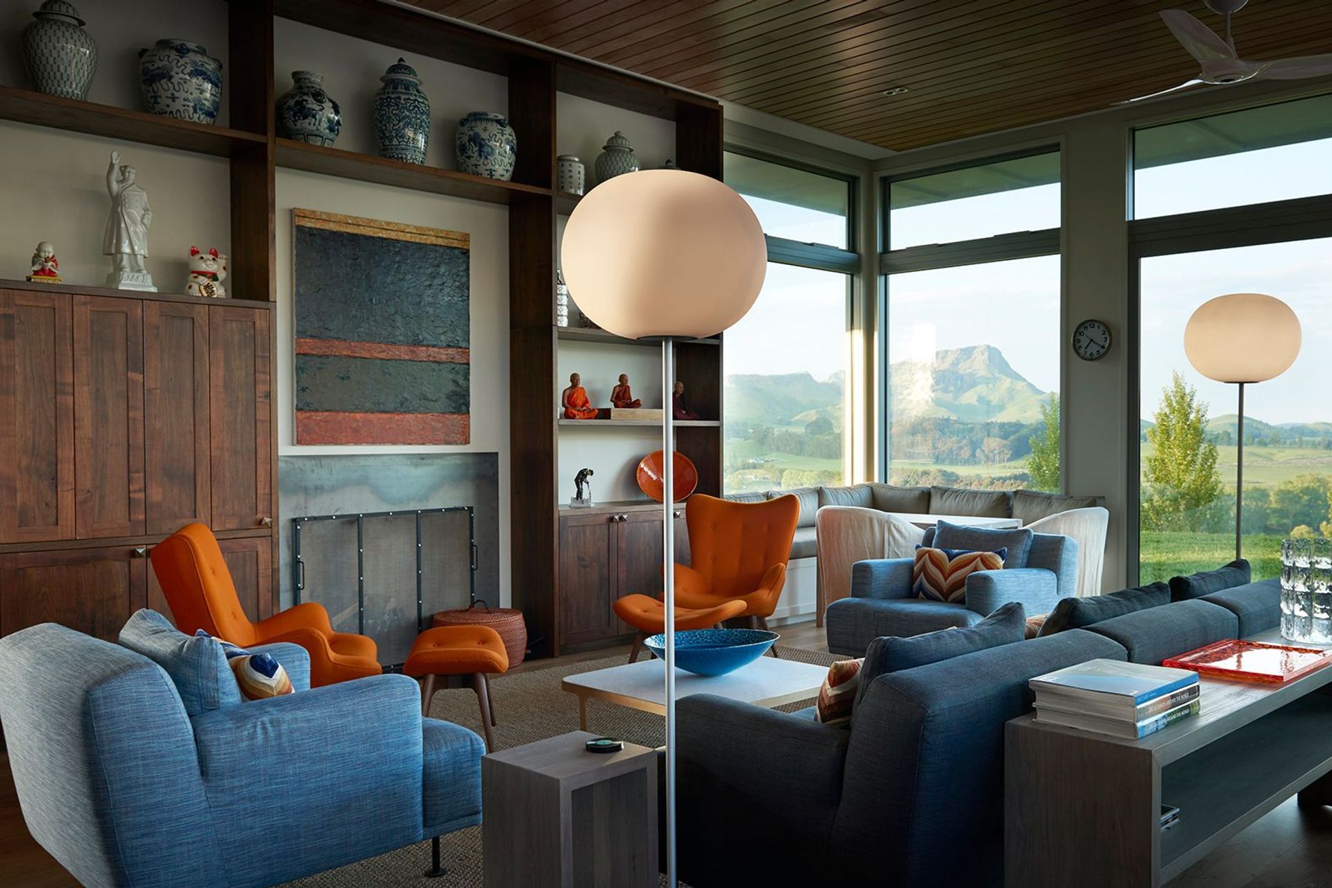 The colourful blue-and-orange lounge area enjoys a direct view out towards the statuesque Te Mata Peak.