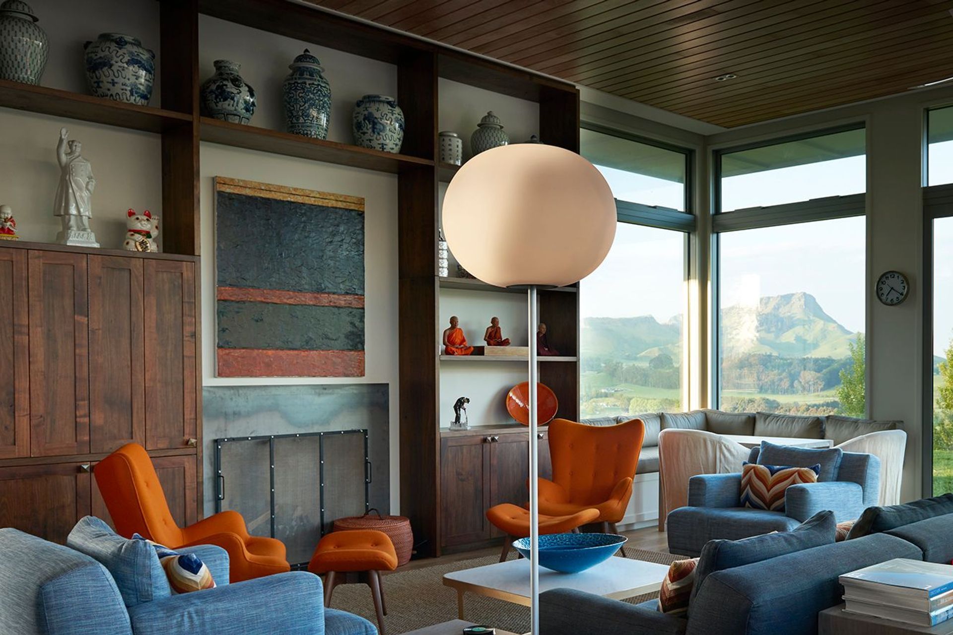 The colourful blue-and-orange lounge area enjoys a direct view out towards the statuesque Te Mata Peak.