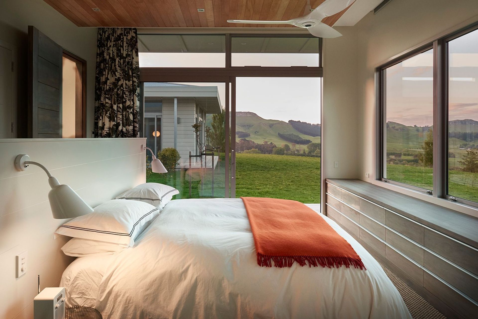 The master bedroom has a north-facing landcape view and opens up into the central courtyard area.