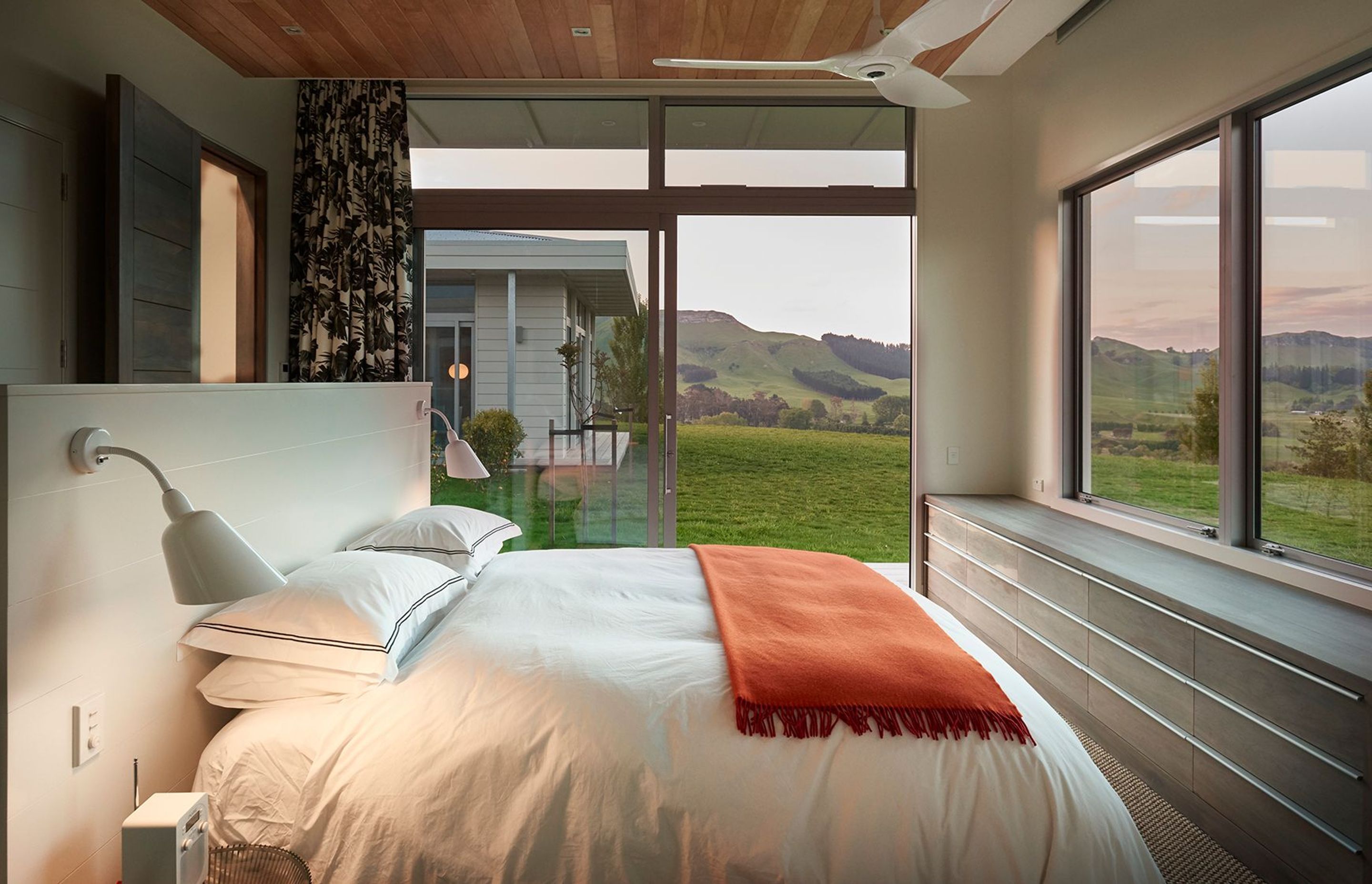 The master bedroom has a north-facing landcape view and opens up into the central courtyard area.
