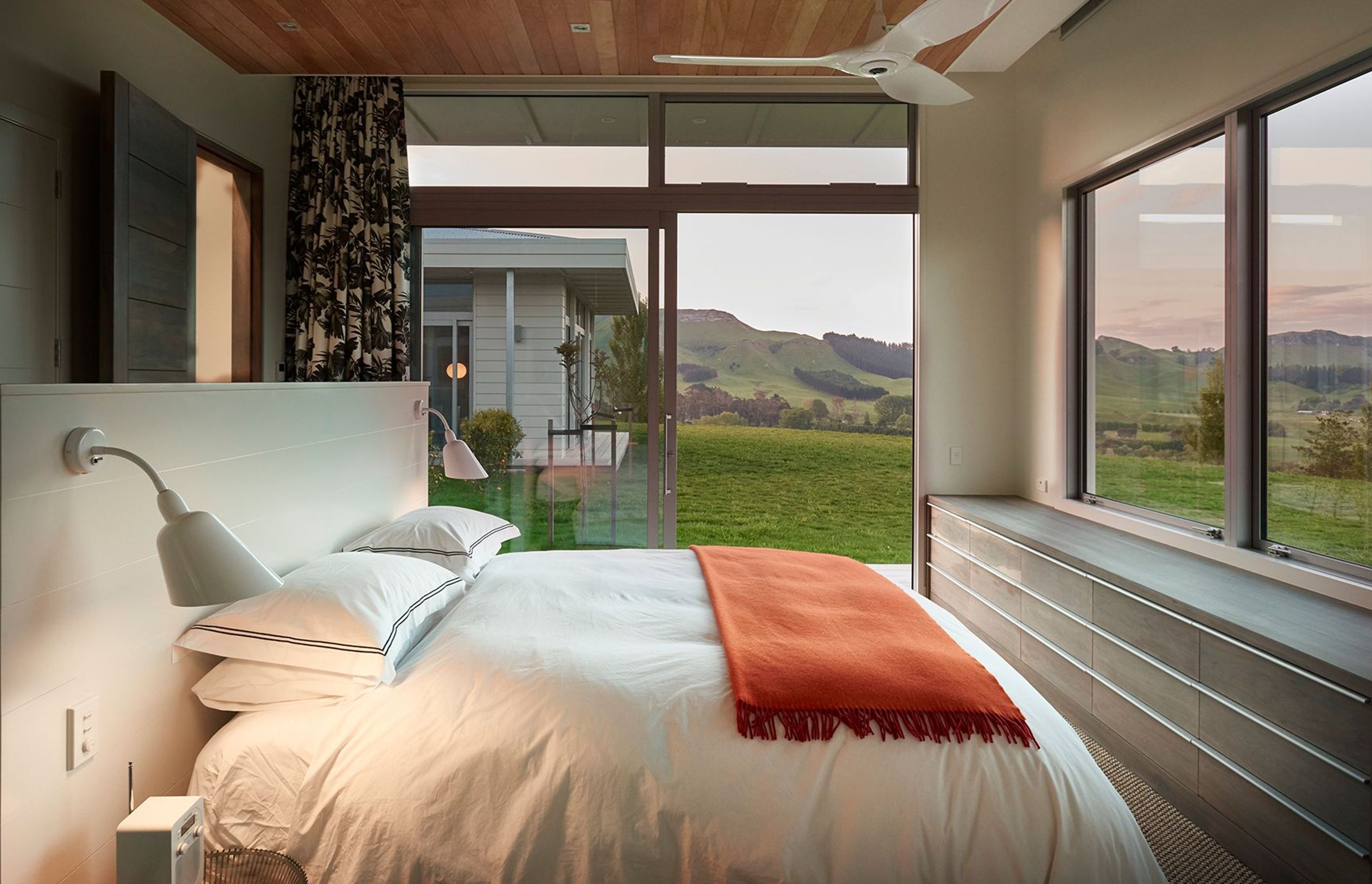 The master bedroom has a north-facing landcape view and opens up into the central courtyard area.