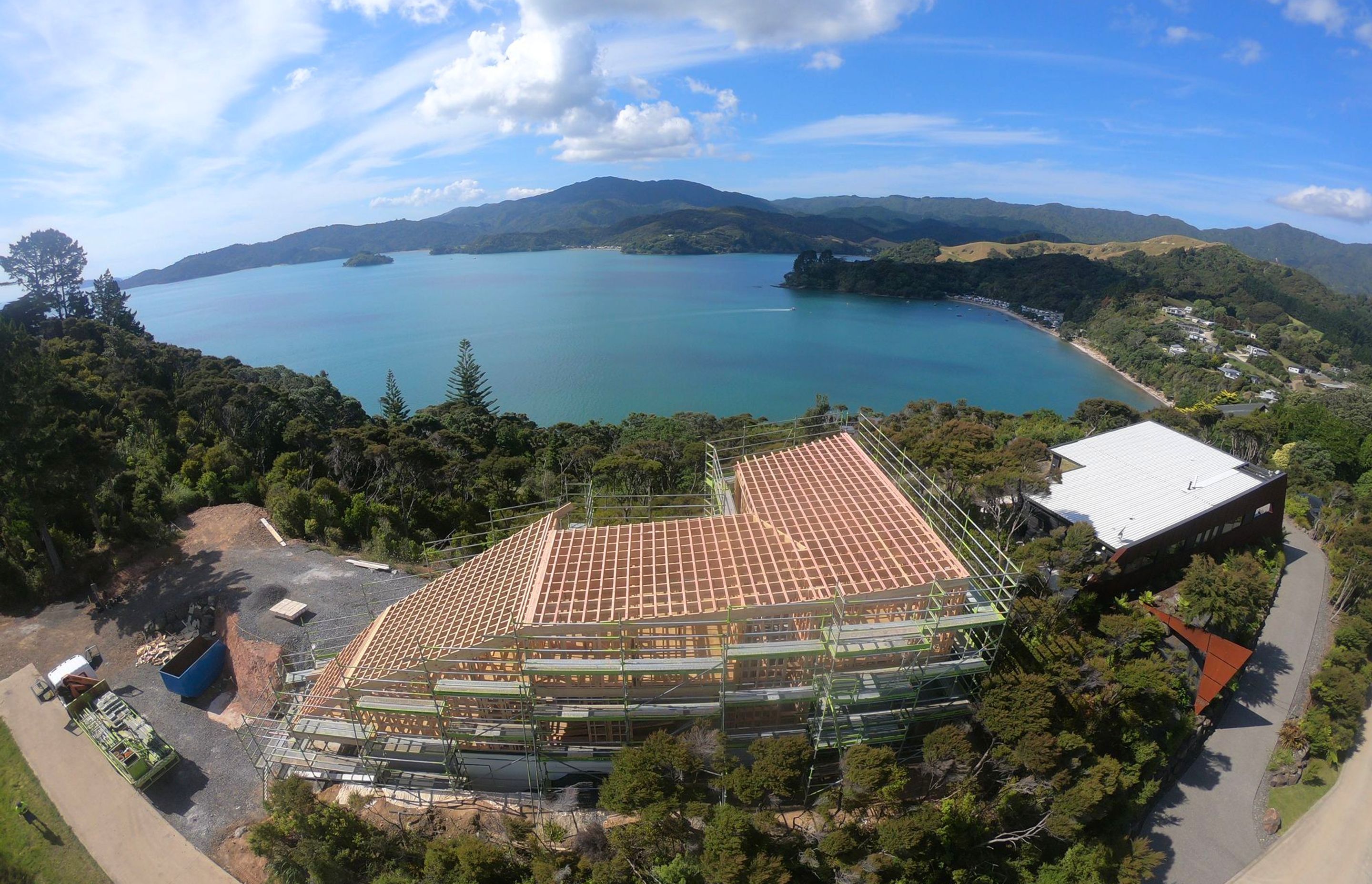 Another shot of the Kerr Ritchie Architects Wyuna Bay house.  Amazing water views on either side. Here are the bare bones of the roof structure on which we installed Trimrib® TS .55 COLORSTEEL® MAXX® in ‘Ironsand’   .  Photo credit to Sean King "Kiwi Way 