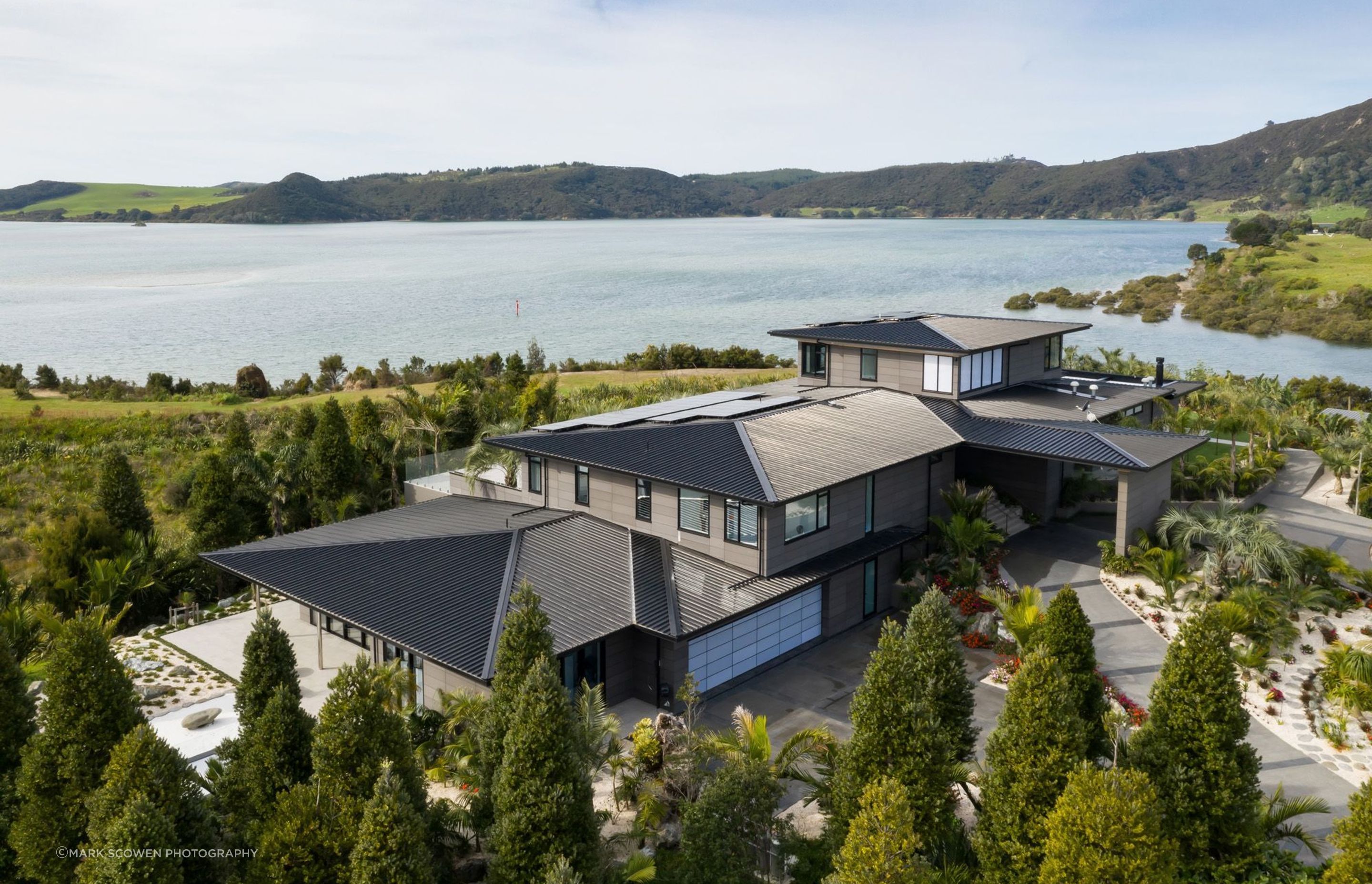 Three Kings House is located within forty-one acres of sub-tropical, Japanese and sculpture gardens on the Houhora Harbour in the Far North of New Zealand.