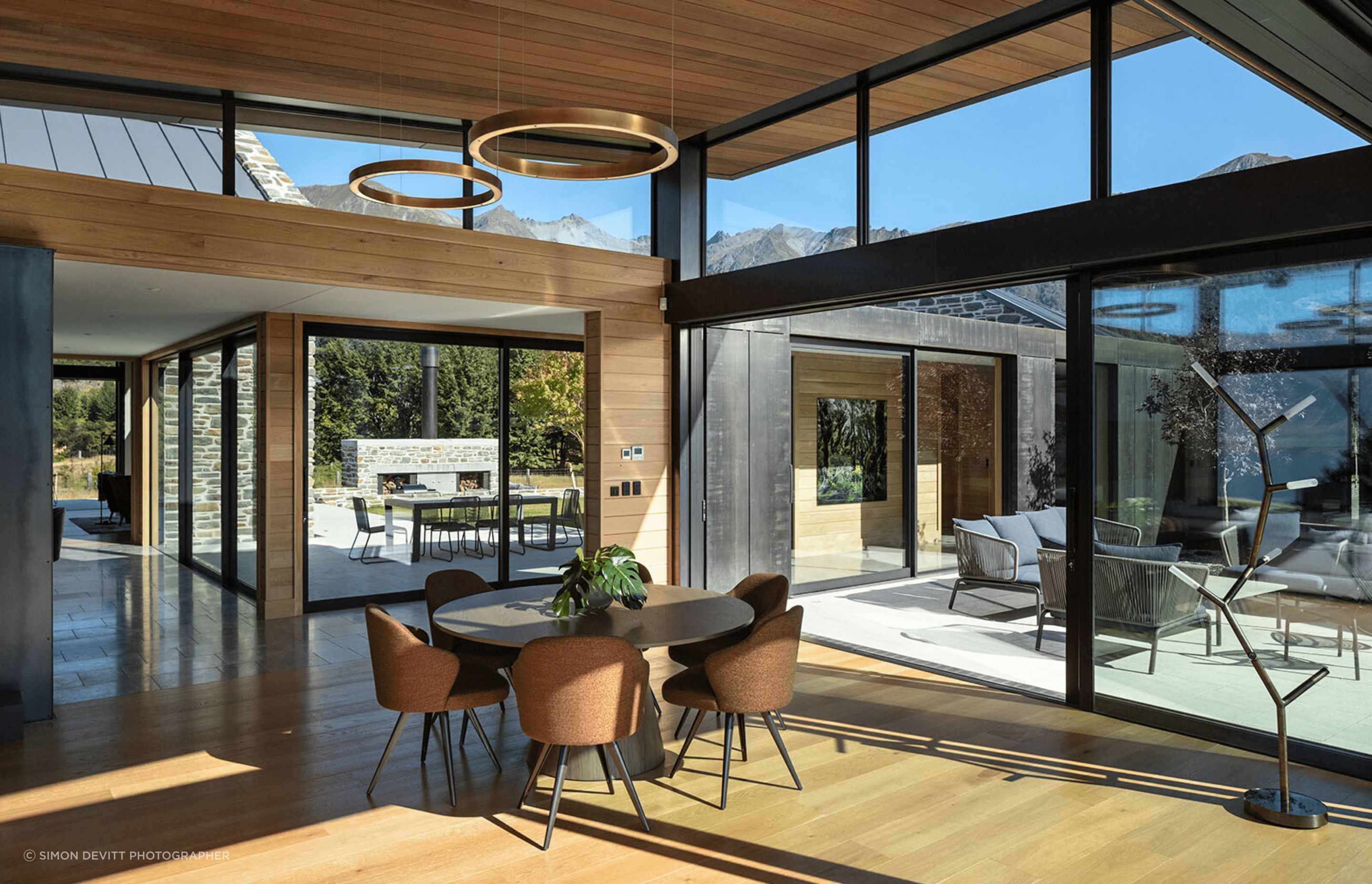 The interior materiality has a focus on natural materials, such as the oak hardwood flooring.