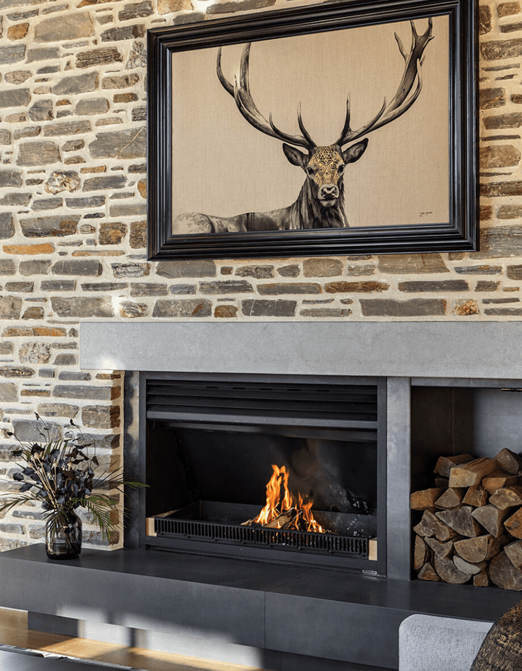 The  adults gather around the schist fireplace in the 'good' room.