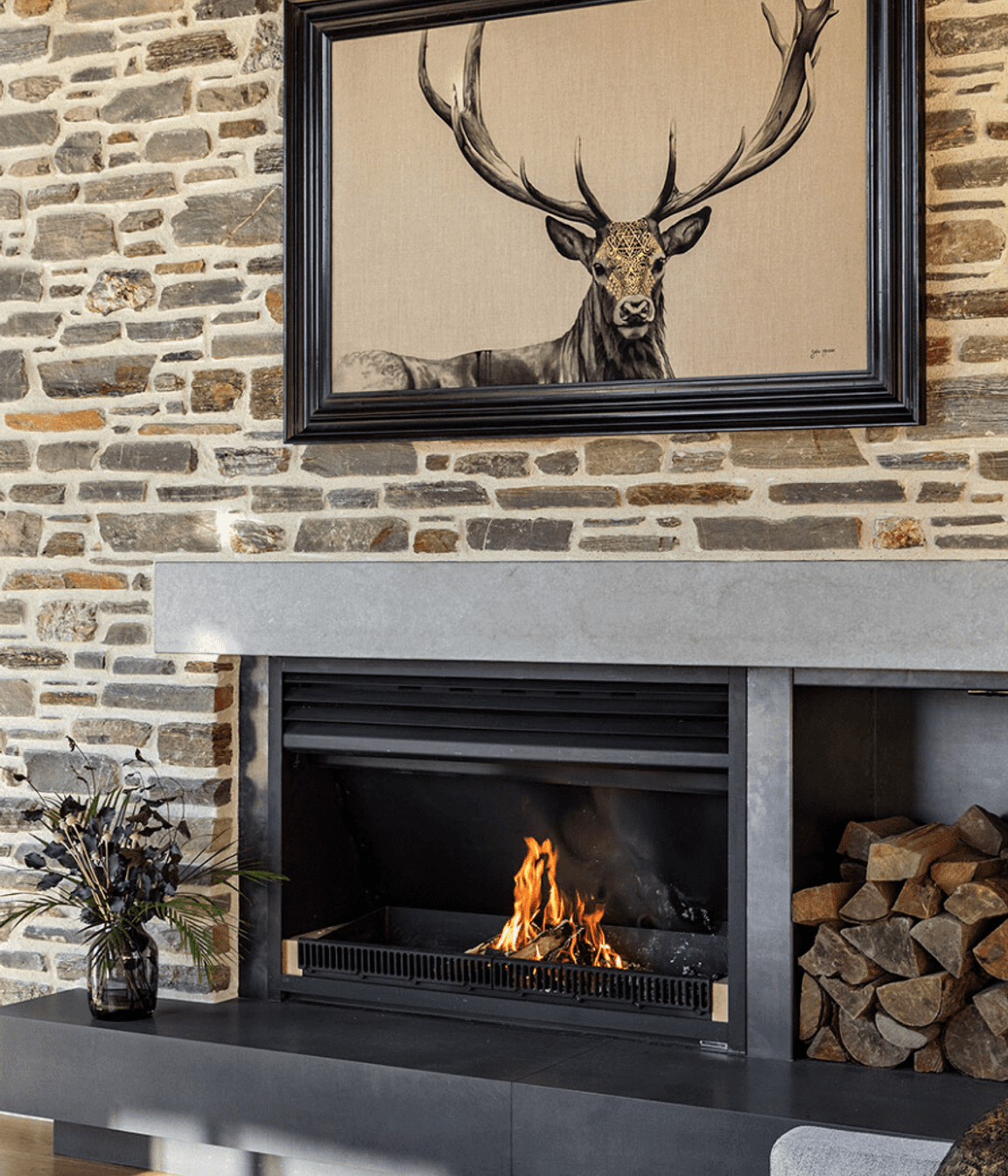 The  adults gather around the schist fireplace in the 'good' room.