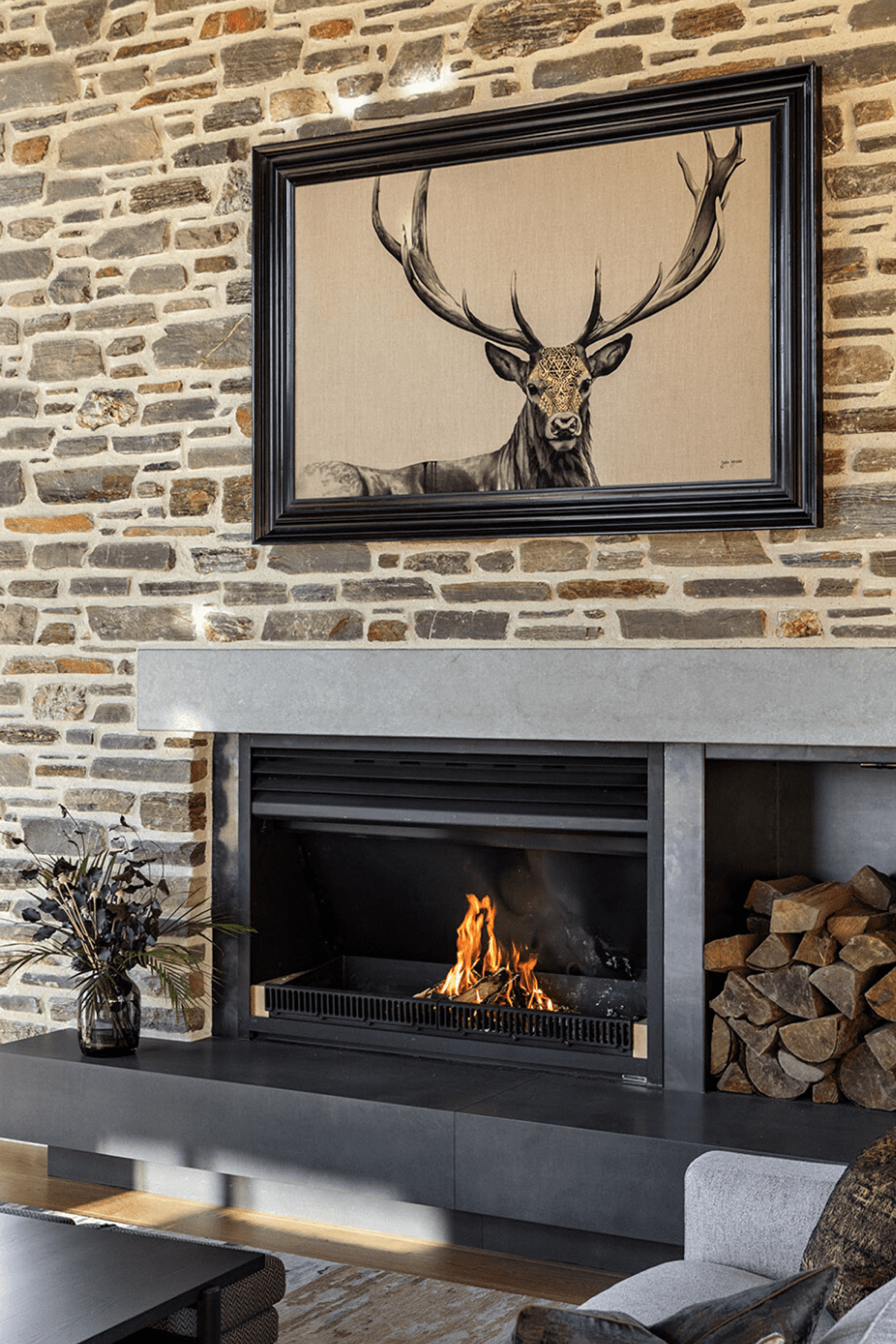 The  adults gather around the schist fireplace in the 'good' room.