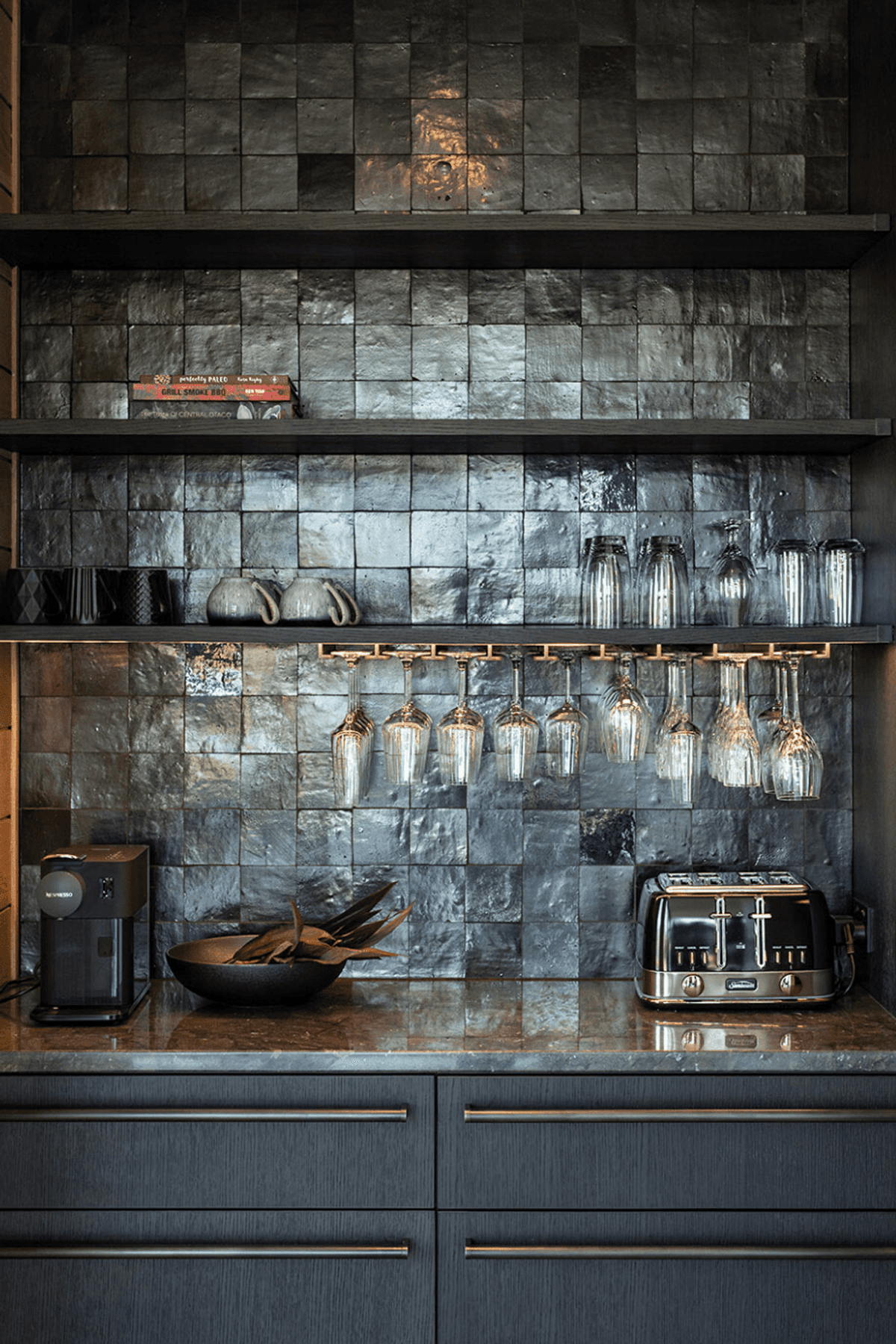 The kitchen scullery features custom cabinetry and steel hardware.