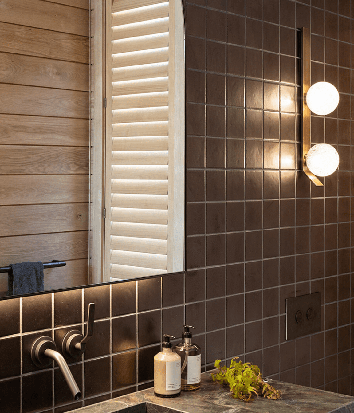 All of the bathrooms used real stone rather than porcelain tiles, to echo the raw and genuine materiality.