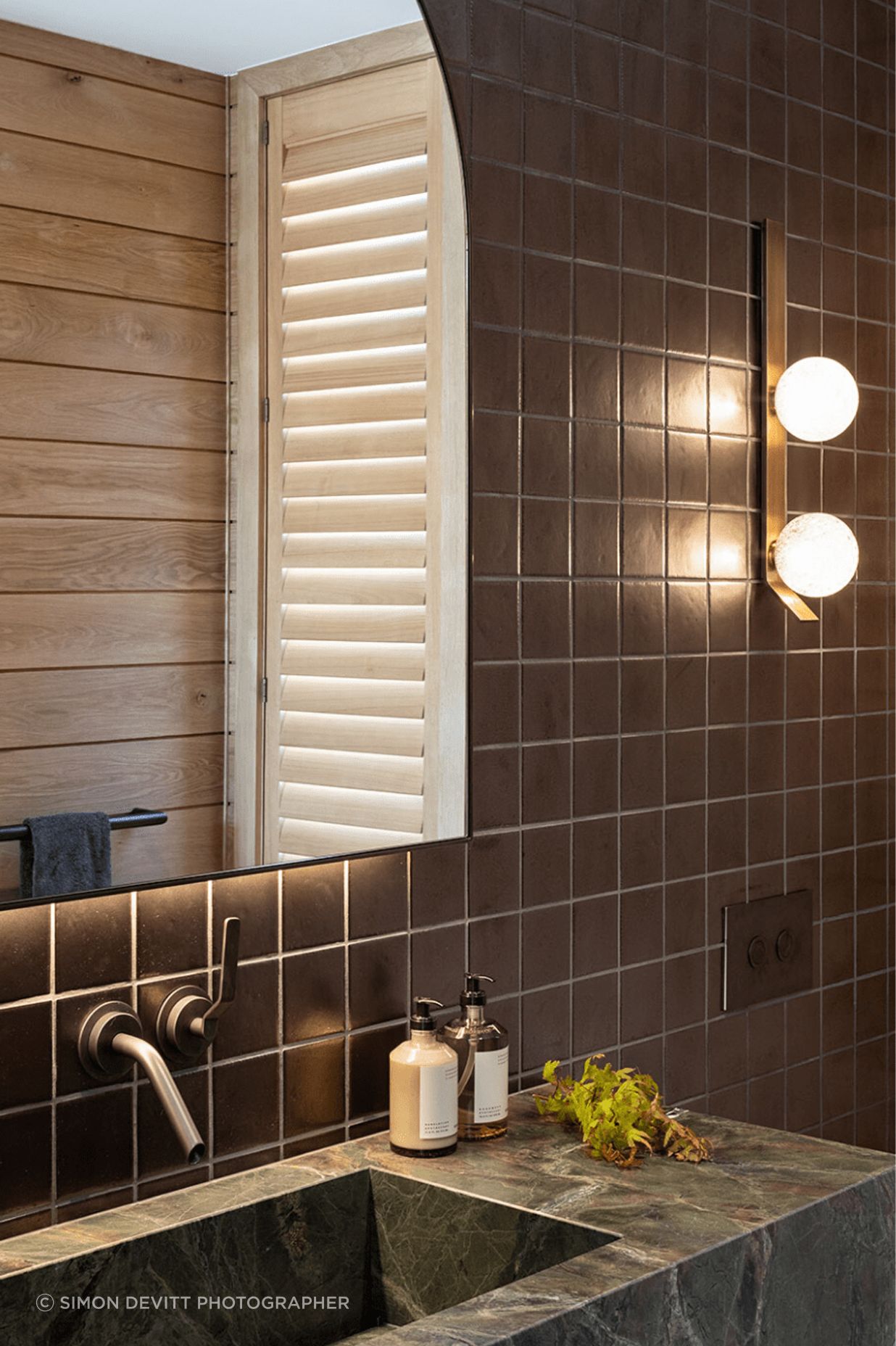 All of the bathrooms used real stone rather than porcelain tiles, to echo the raw and genuine materiality.