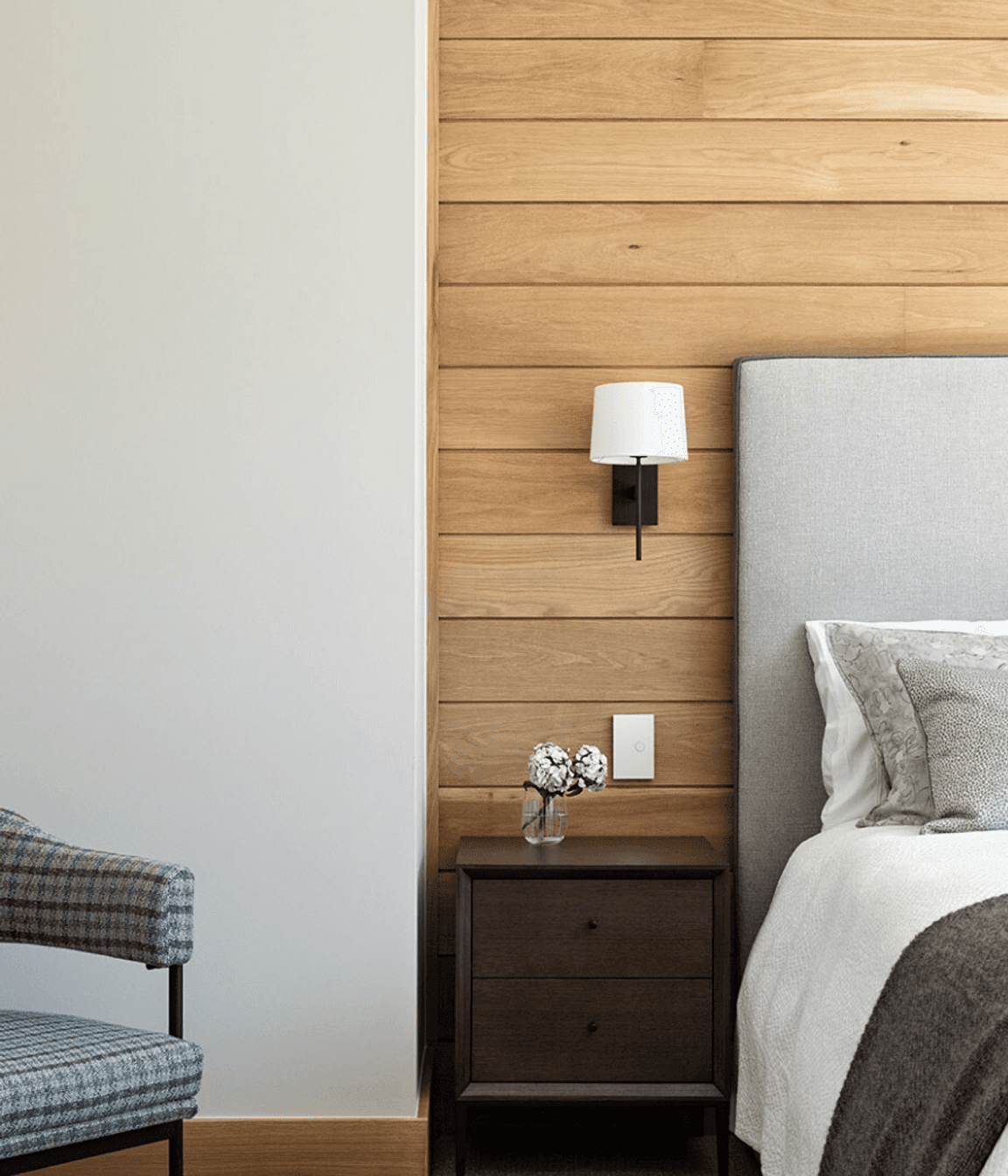 Oak timber lining in some of the guest rooms ties the material palette back to the land.