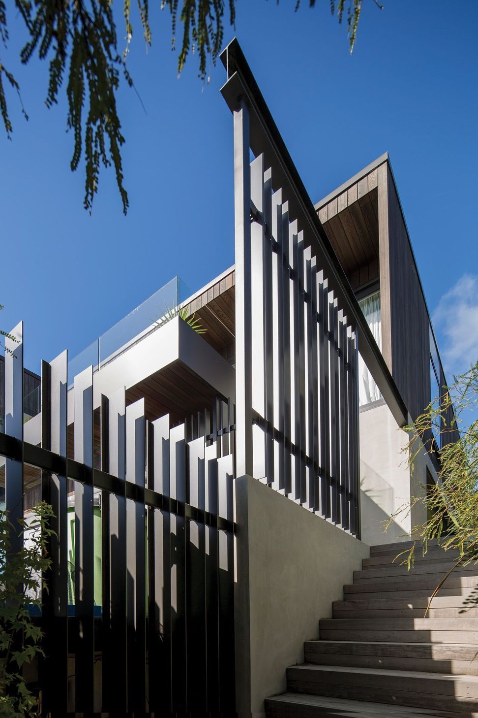 The steel entrance fins were designed and installed by Objects.