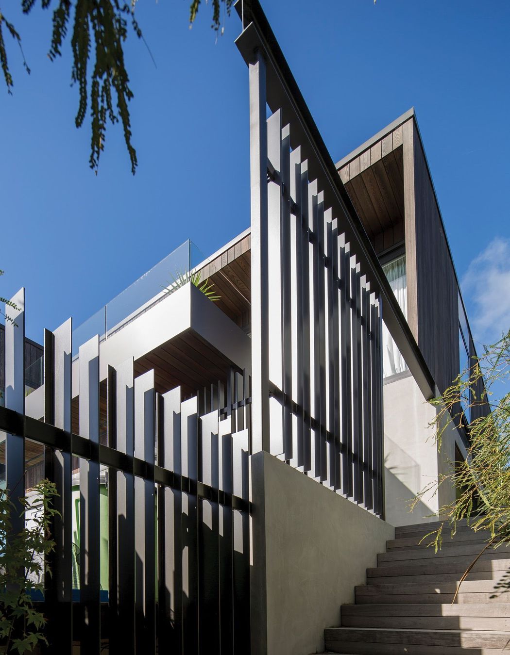 The steel entrance fins were designed and installed by Objects.