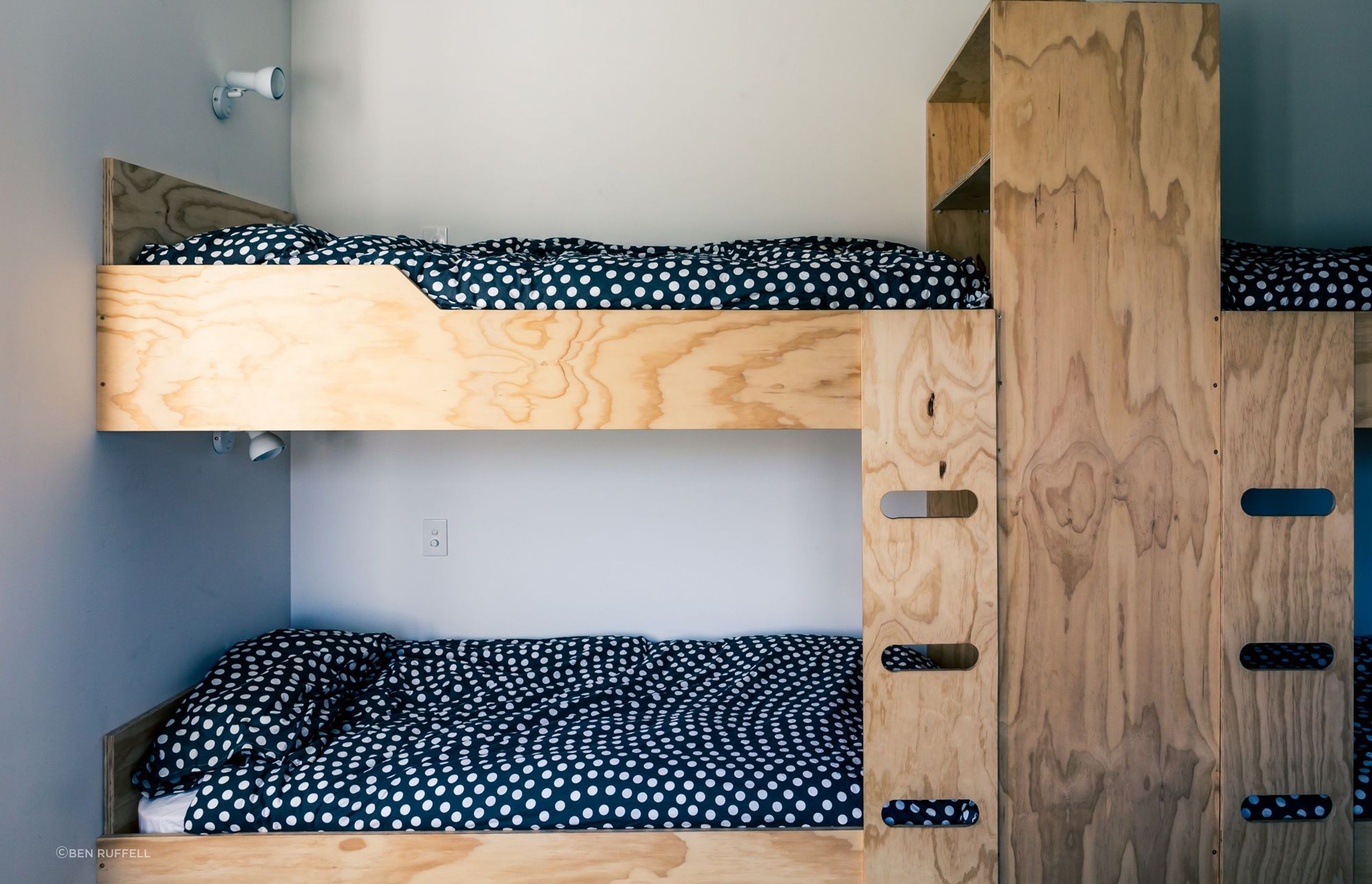 The children's bedroom includes two sets of bunk beds—designed by the architect—ideal for when overseas visitors come to stay.