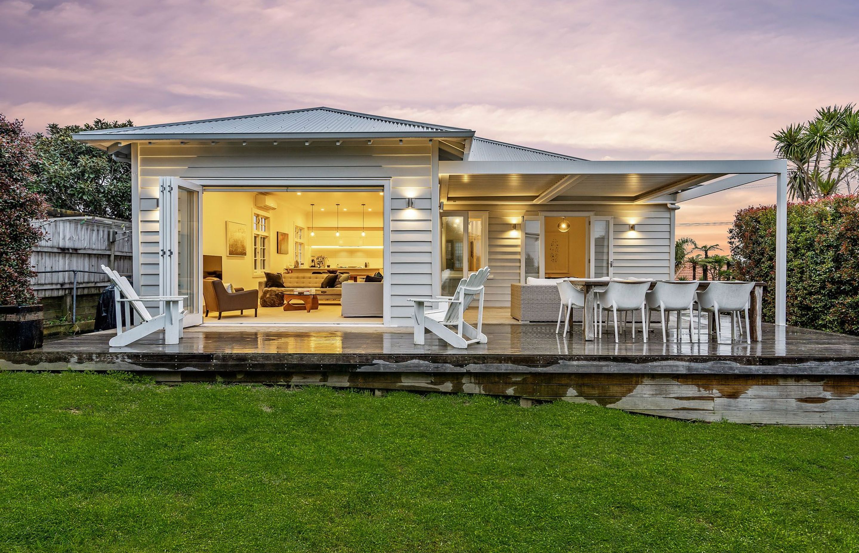 The owner wanted to retain the original bungalow 'feel' so the floor plan changed very little, whereas more typically an extension would have created one large living area with a single opening onto the deck, in this instance, the set-back was maintained 