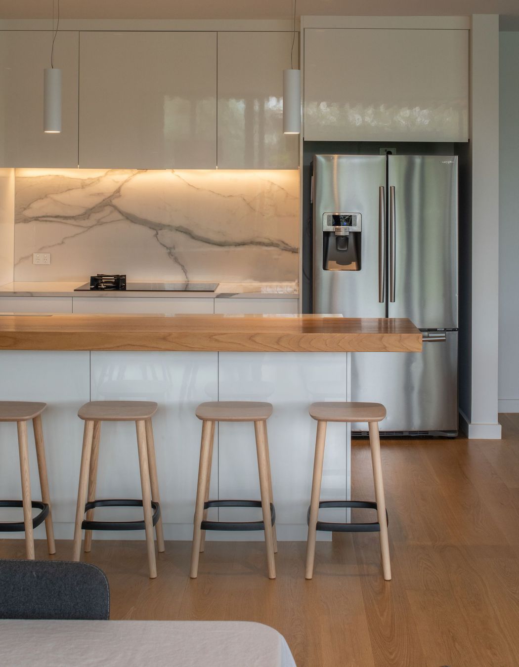 A simple, functional kitchen was designed for family use with timber a key feature.