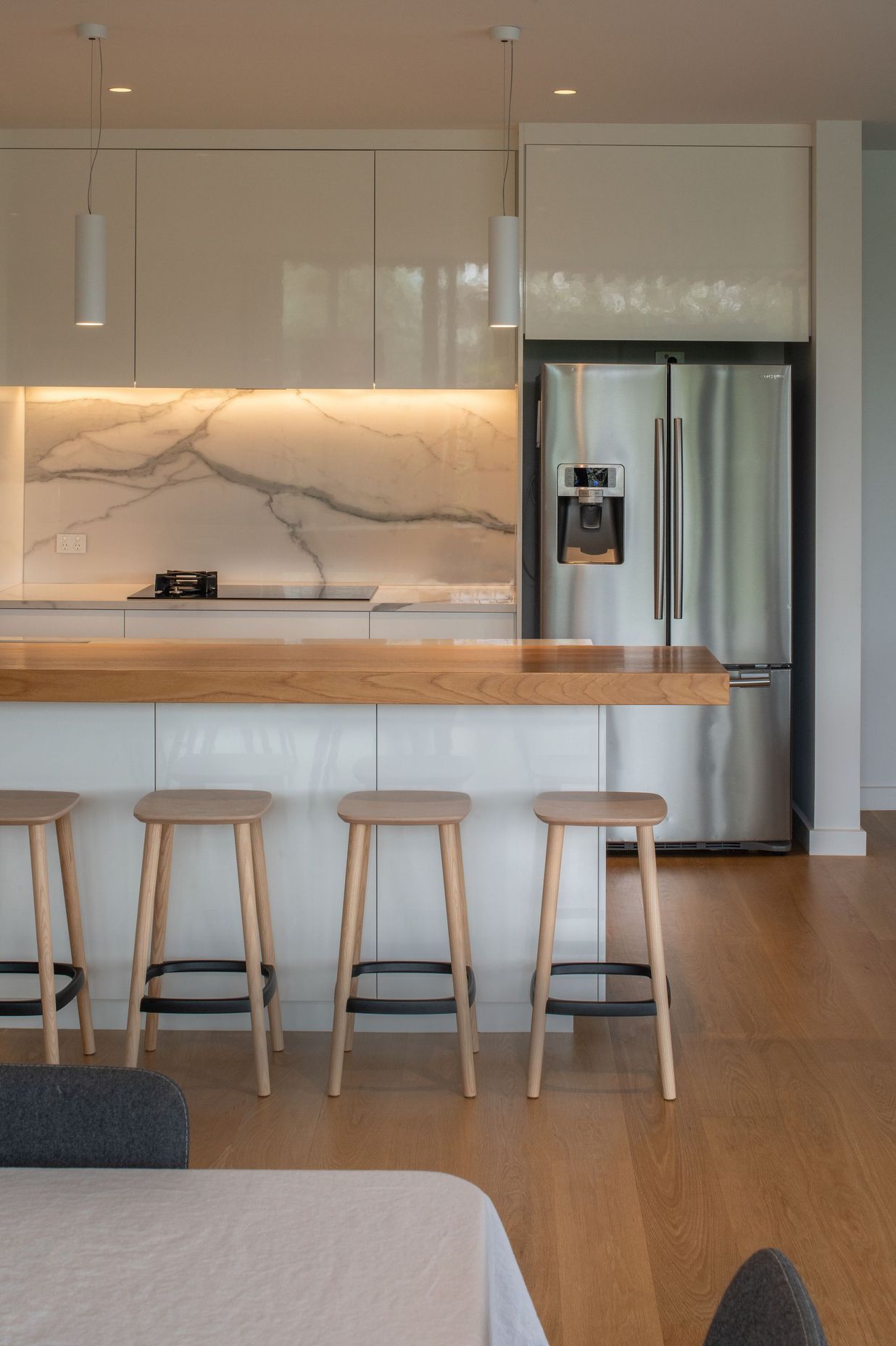 A simple, functional kitchen was designed for family use with timber a key feature.