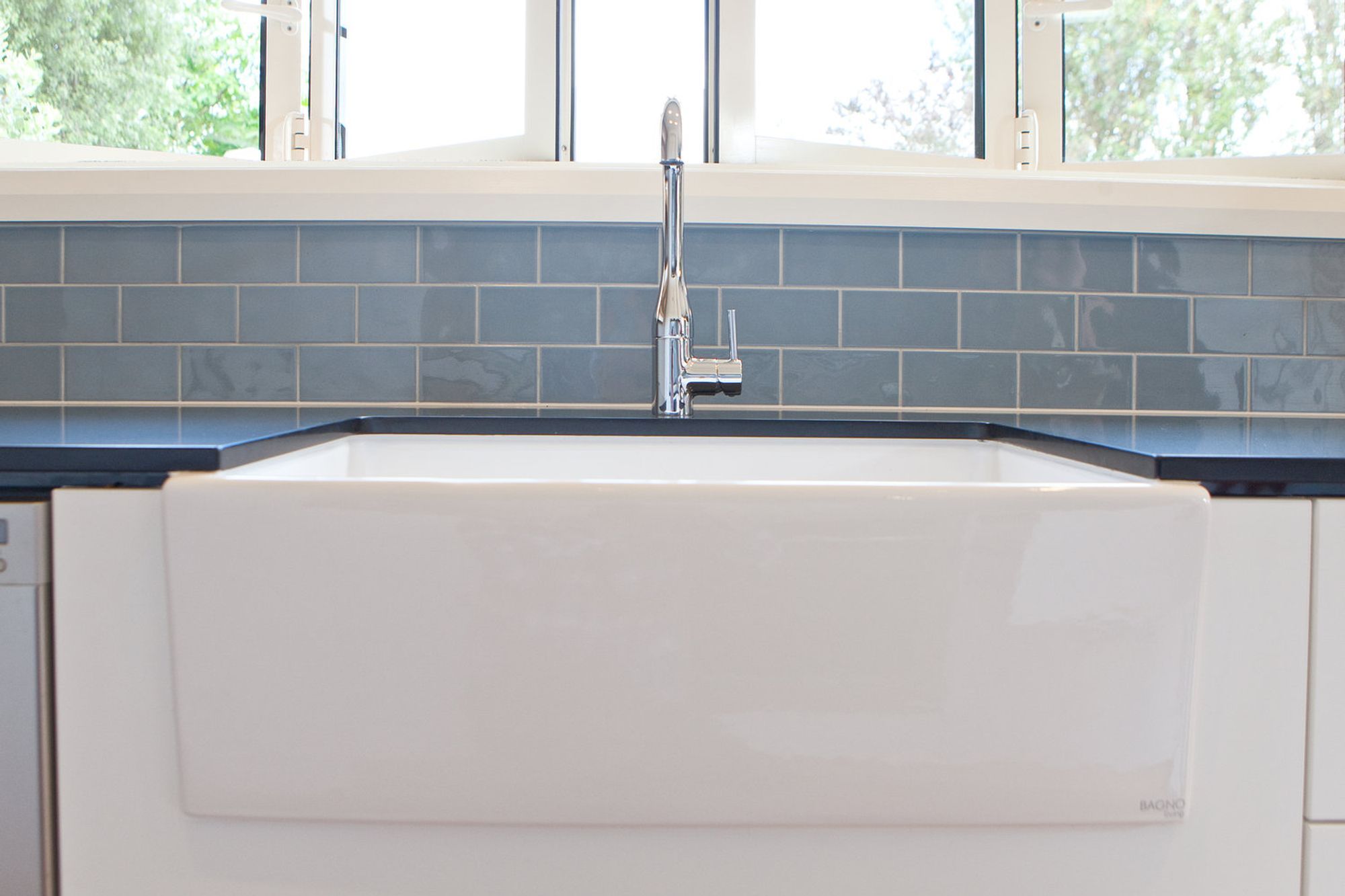 A butlers sink and gooseneck tap.