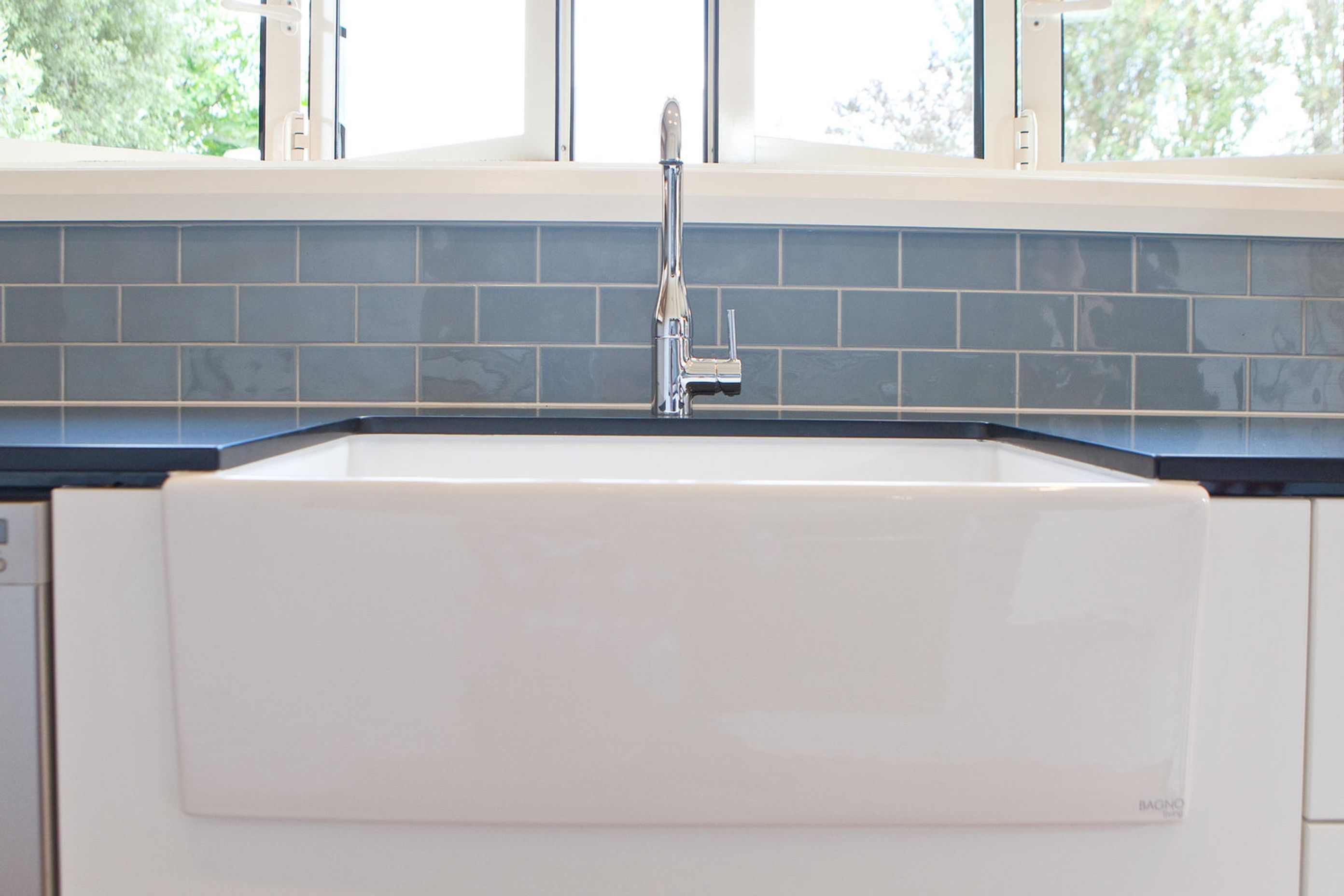 A butlers sink and gooseneck tap.