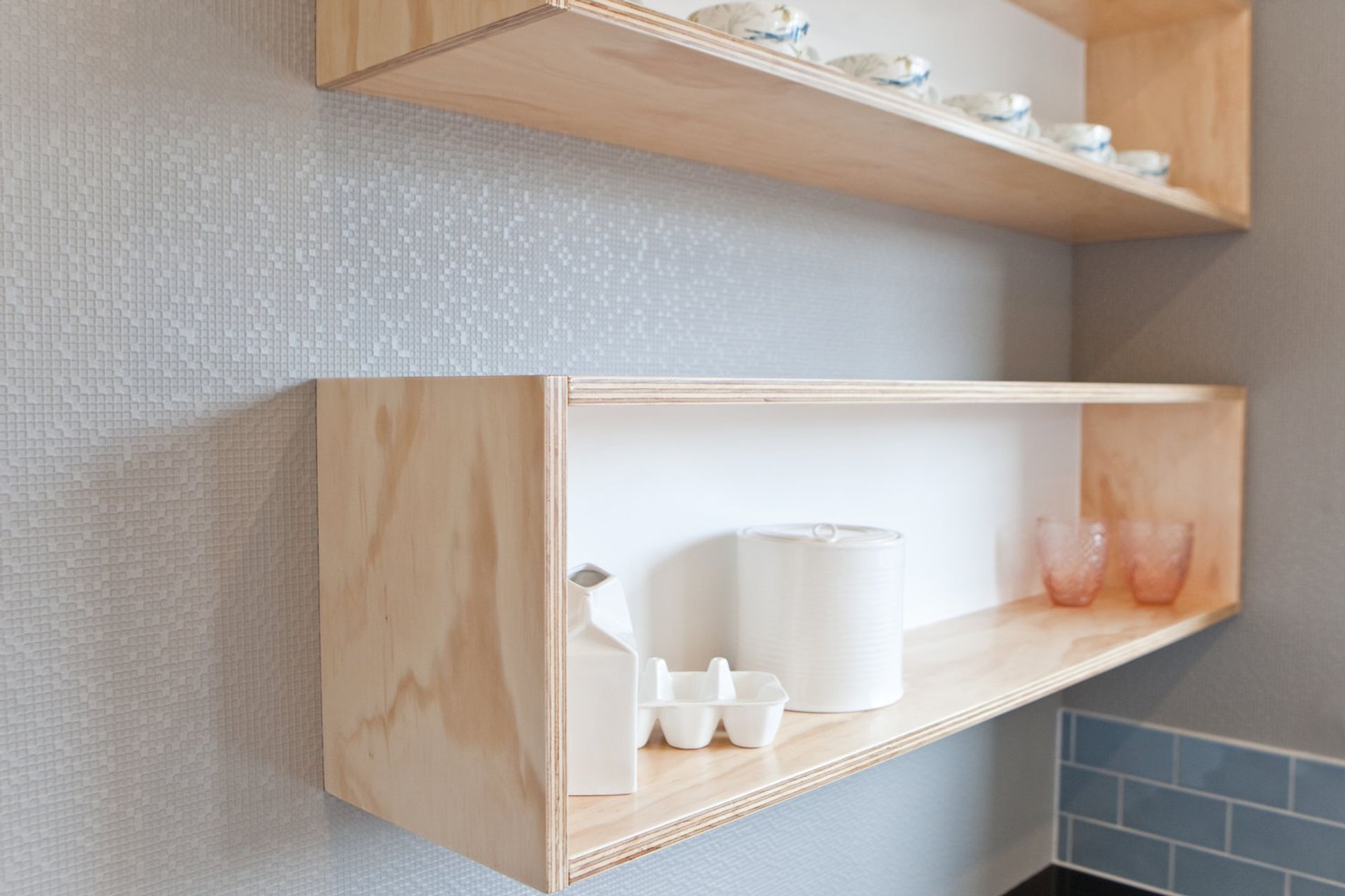 Plywood open shelving.