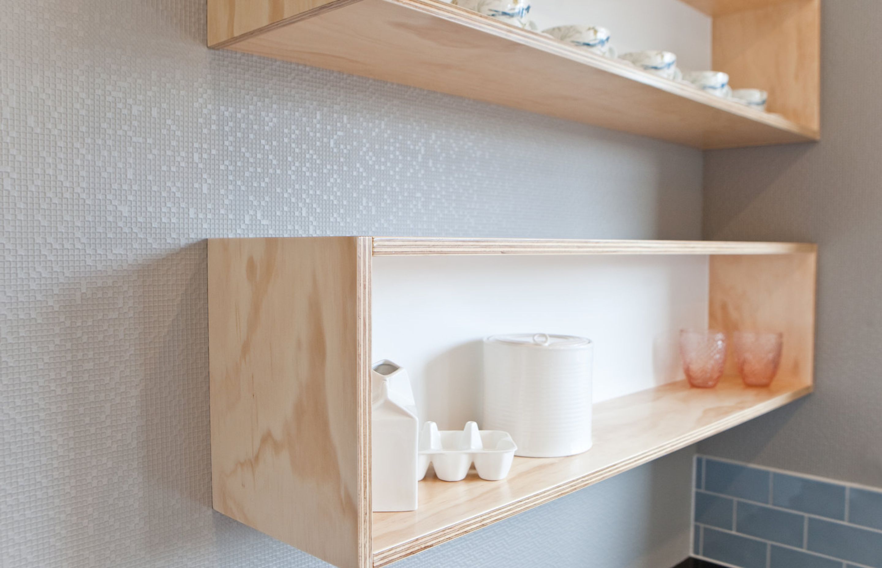 Plywood open shelving.